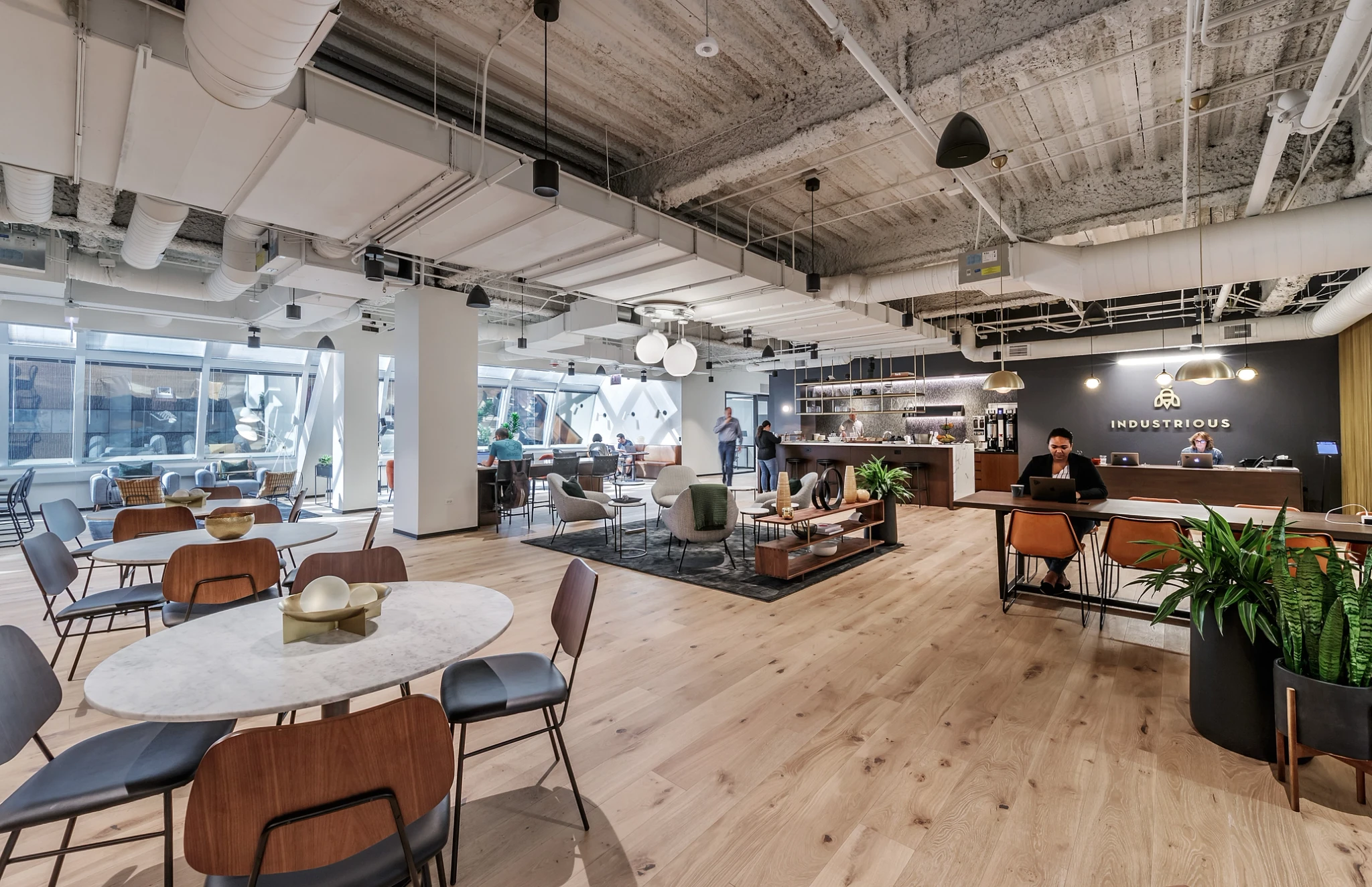 An expansive workspace in Chicago's office district featuring tables and chairs.