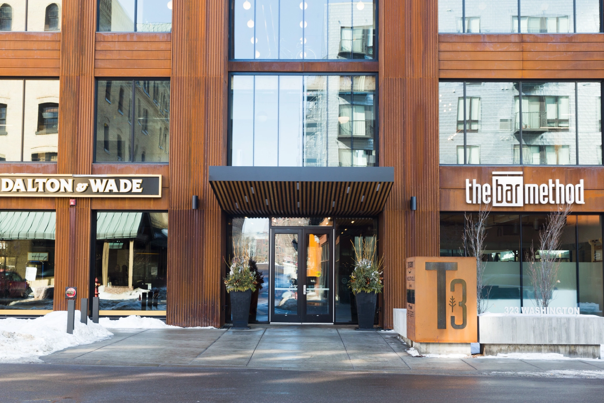 A Minneapolis office workspace with a sign that says T3