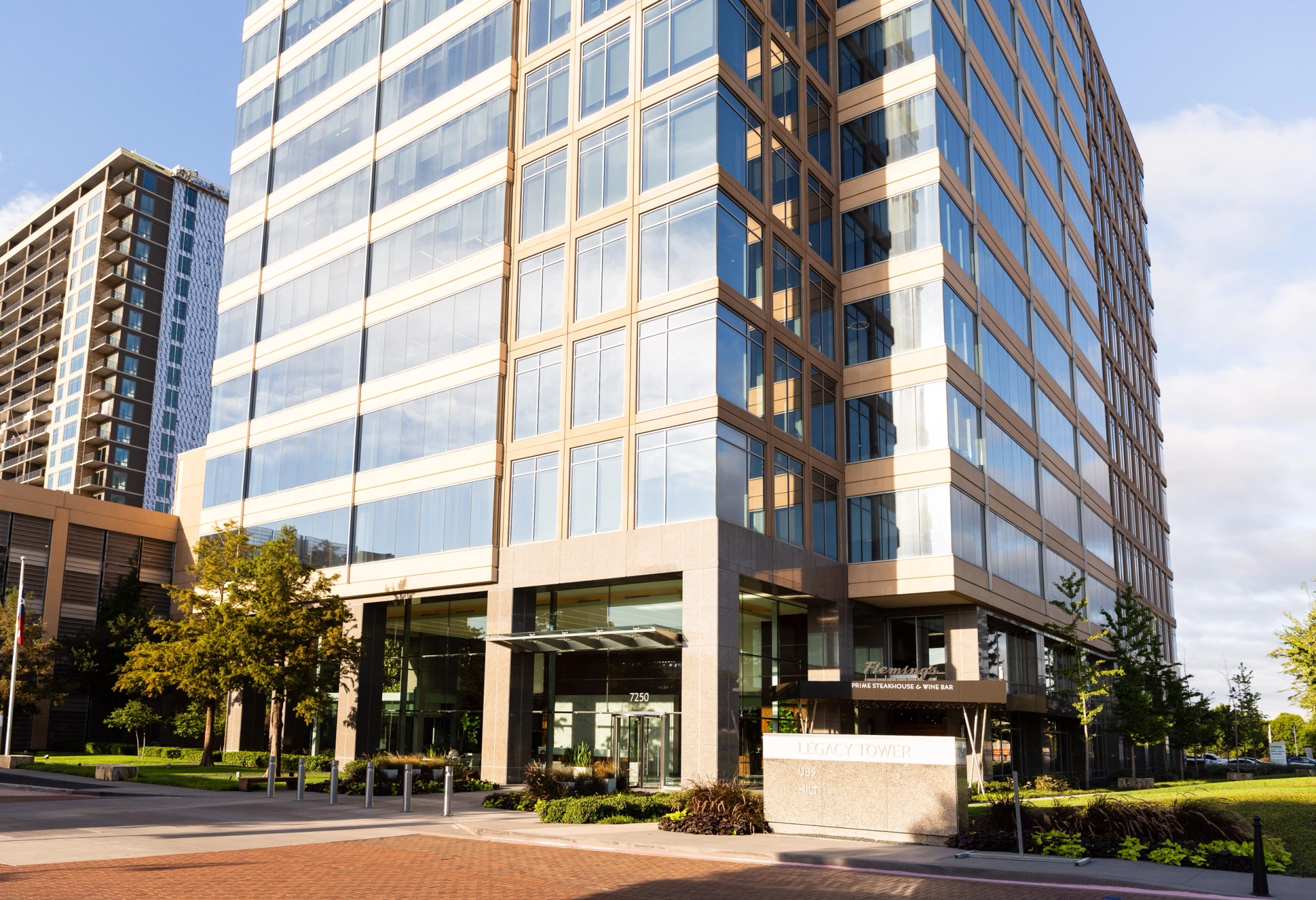 a large glass office building with workspace facilities.