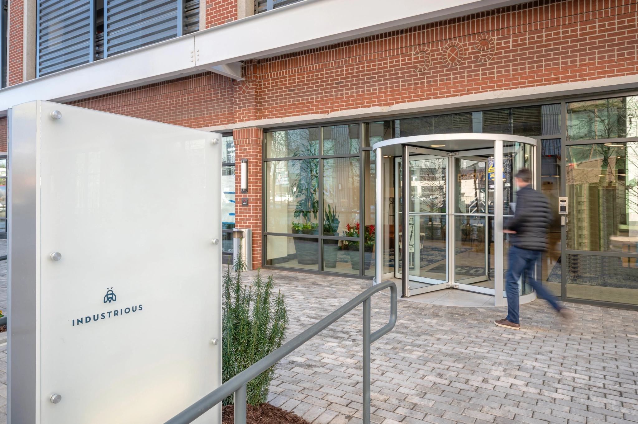 An office entrance with a sign on it.