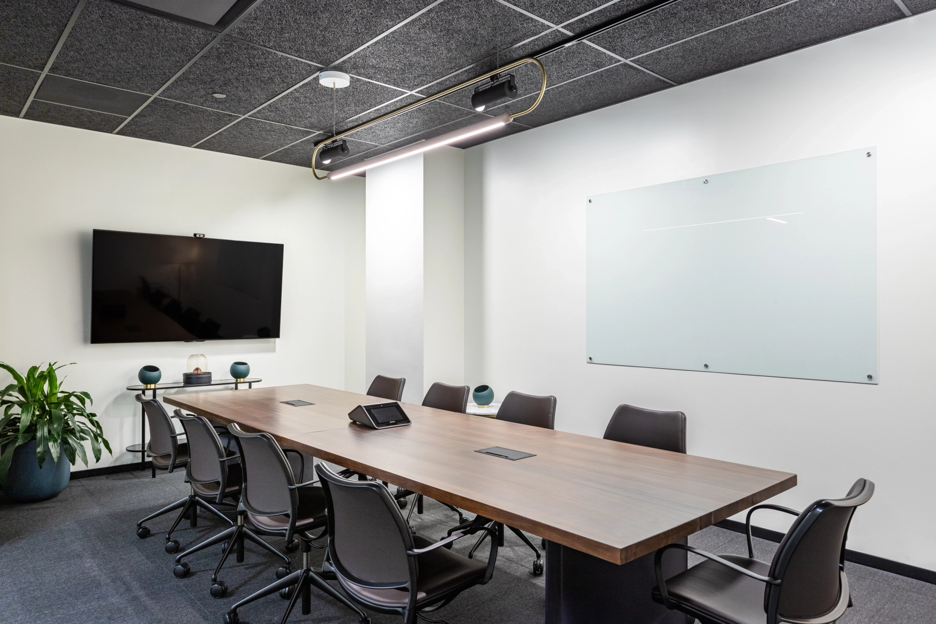 A Miami conference room with a large table and chairs, ideal for office workspace.