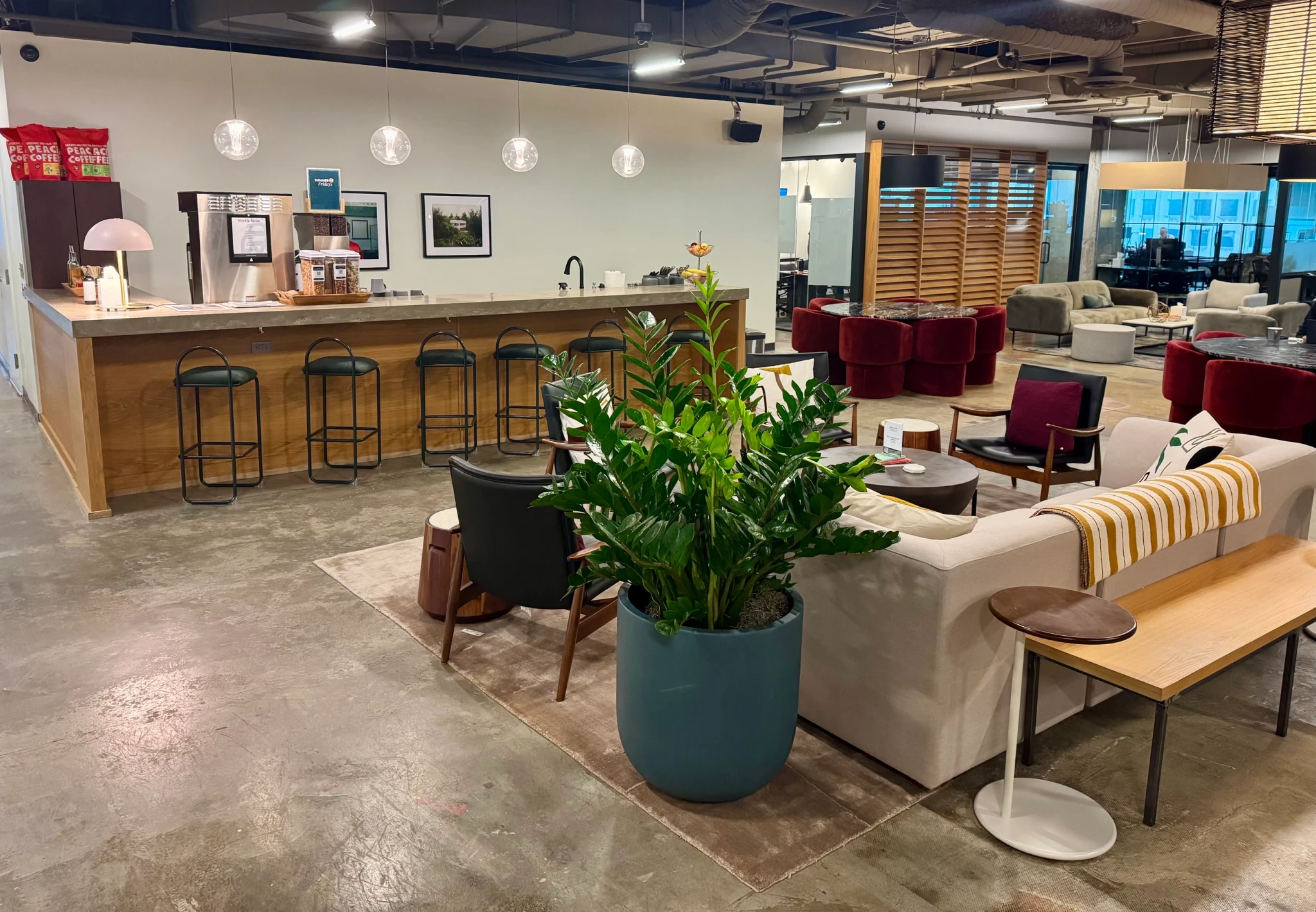 A modern coworking office with a table and chairs in Minneapolis.