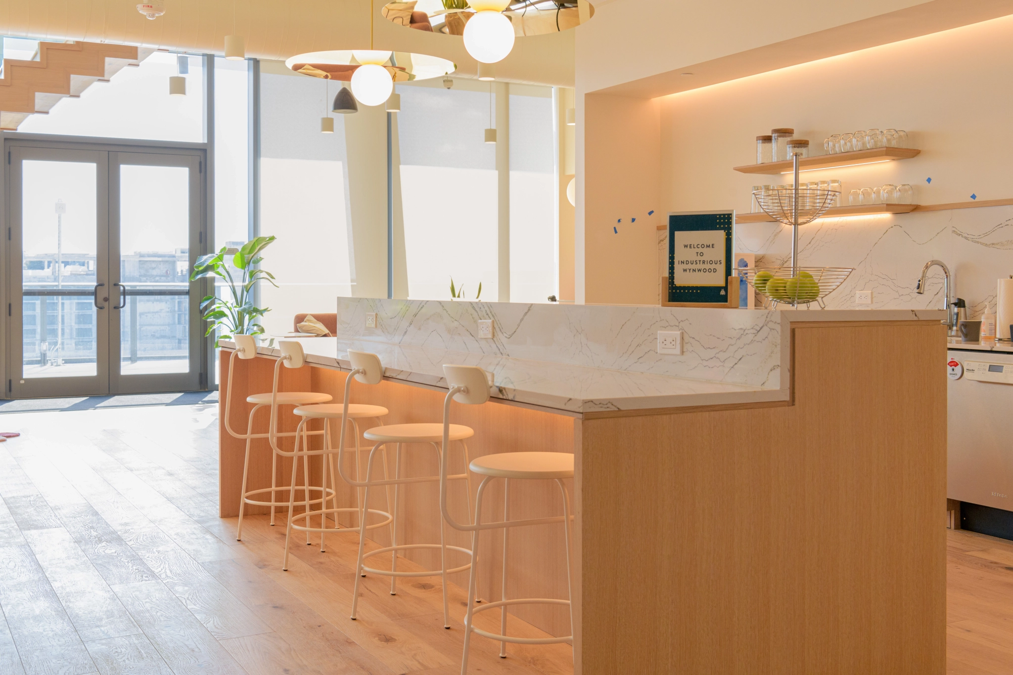 A wooden floor in a kitchen workspace.