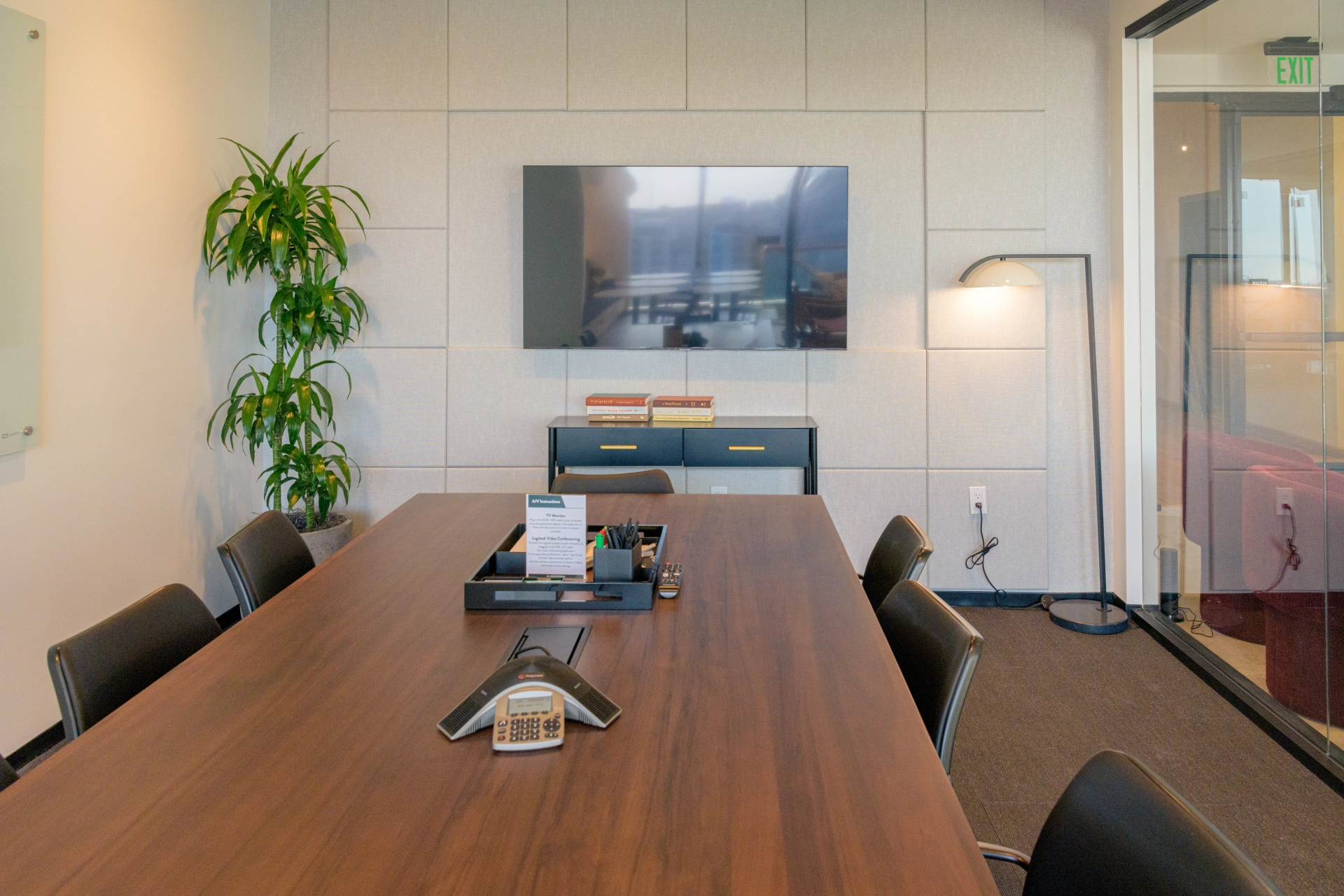 A workspace table in a meeting room.
