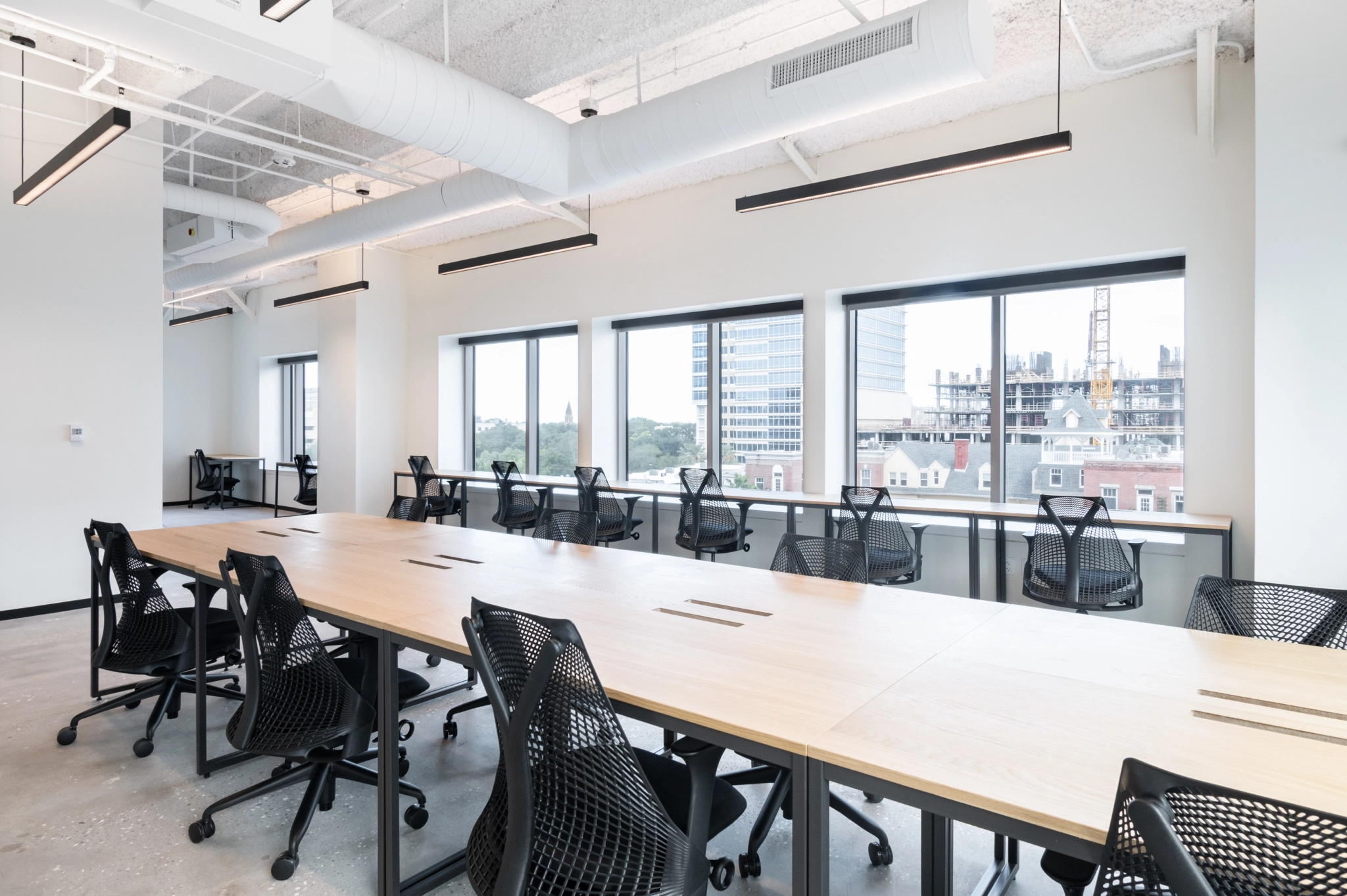 Coworking area at Industrious 200 Central Ave