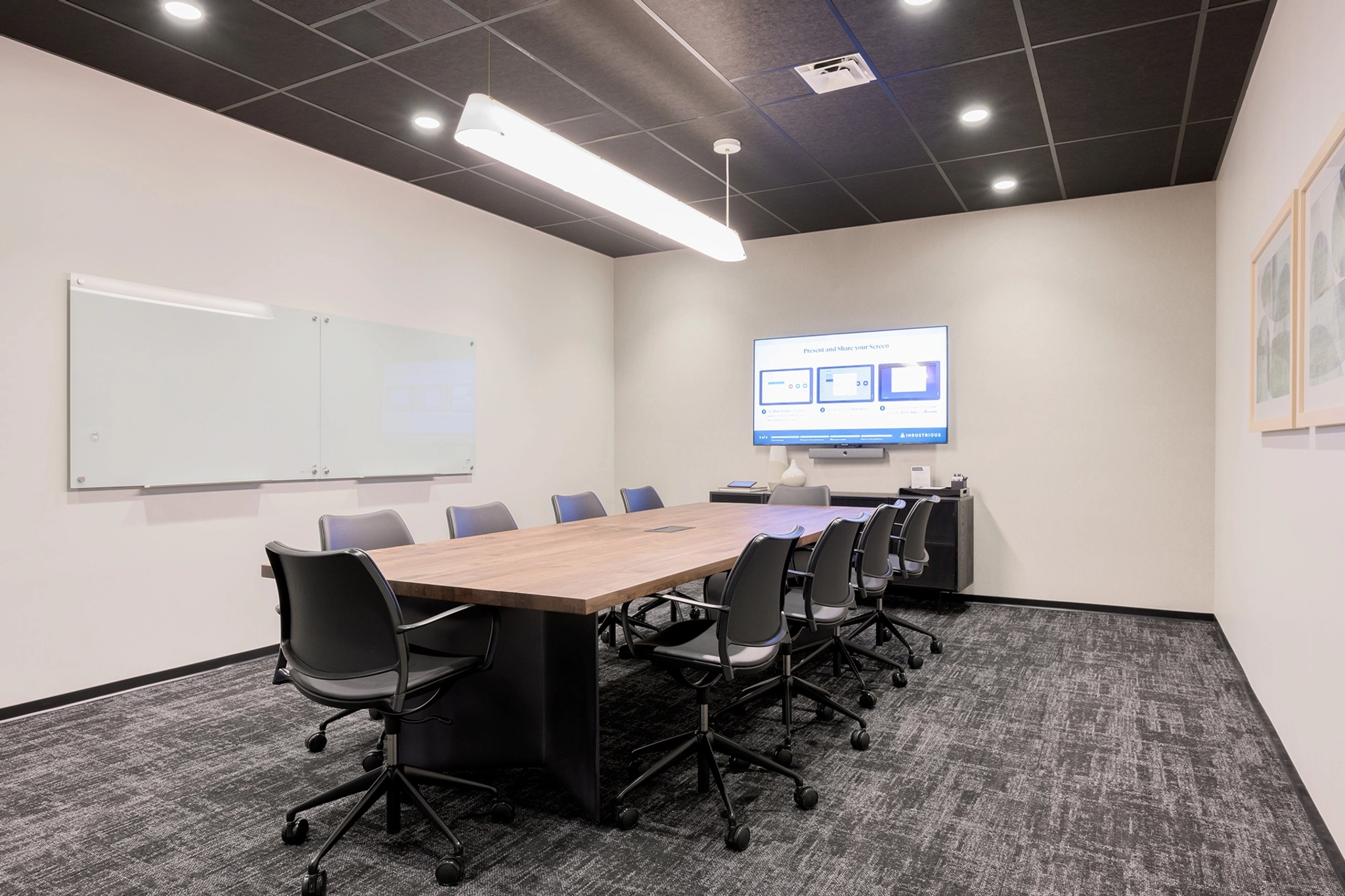 A conference room in the Phoenix office with a large table and chairs.