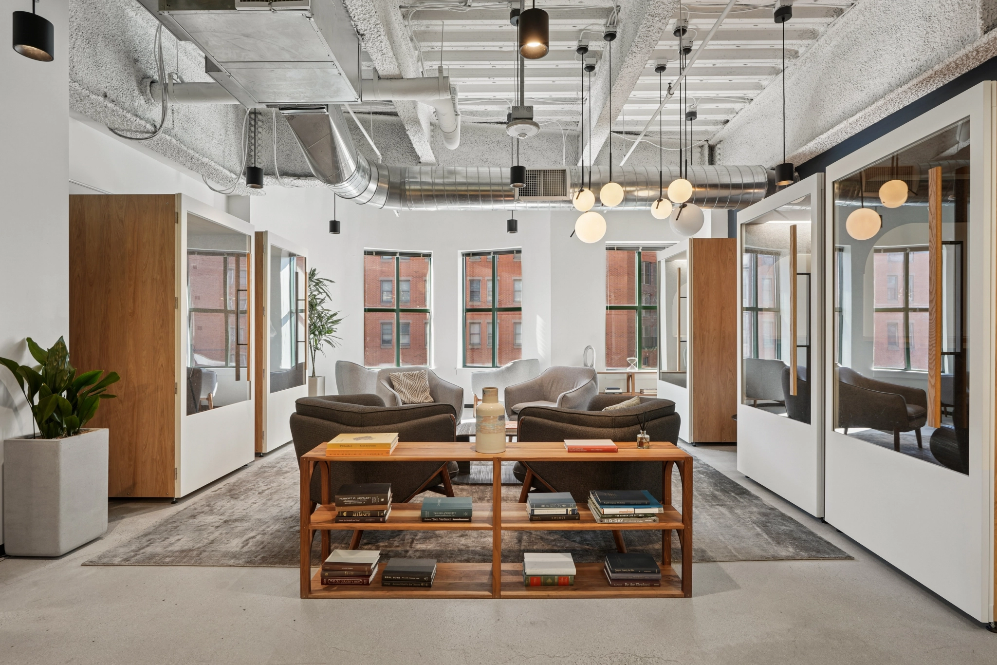 a large, bright meeting room with a large screen