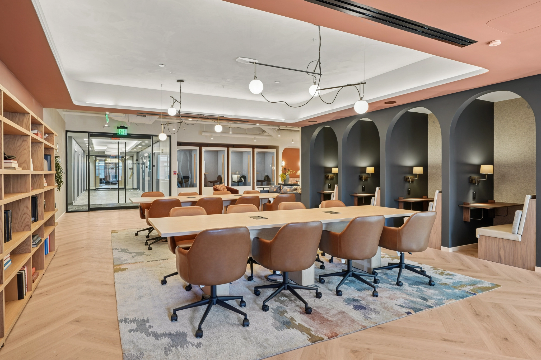 a large, bright meeting room with a large screen