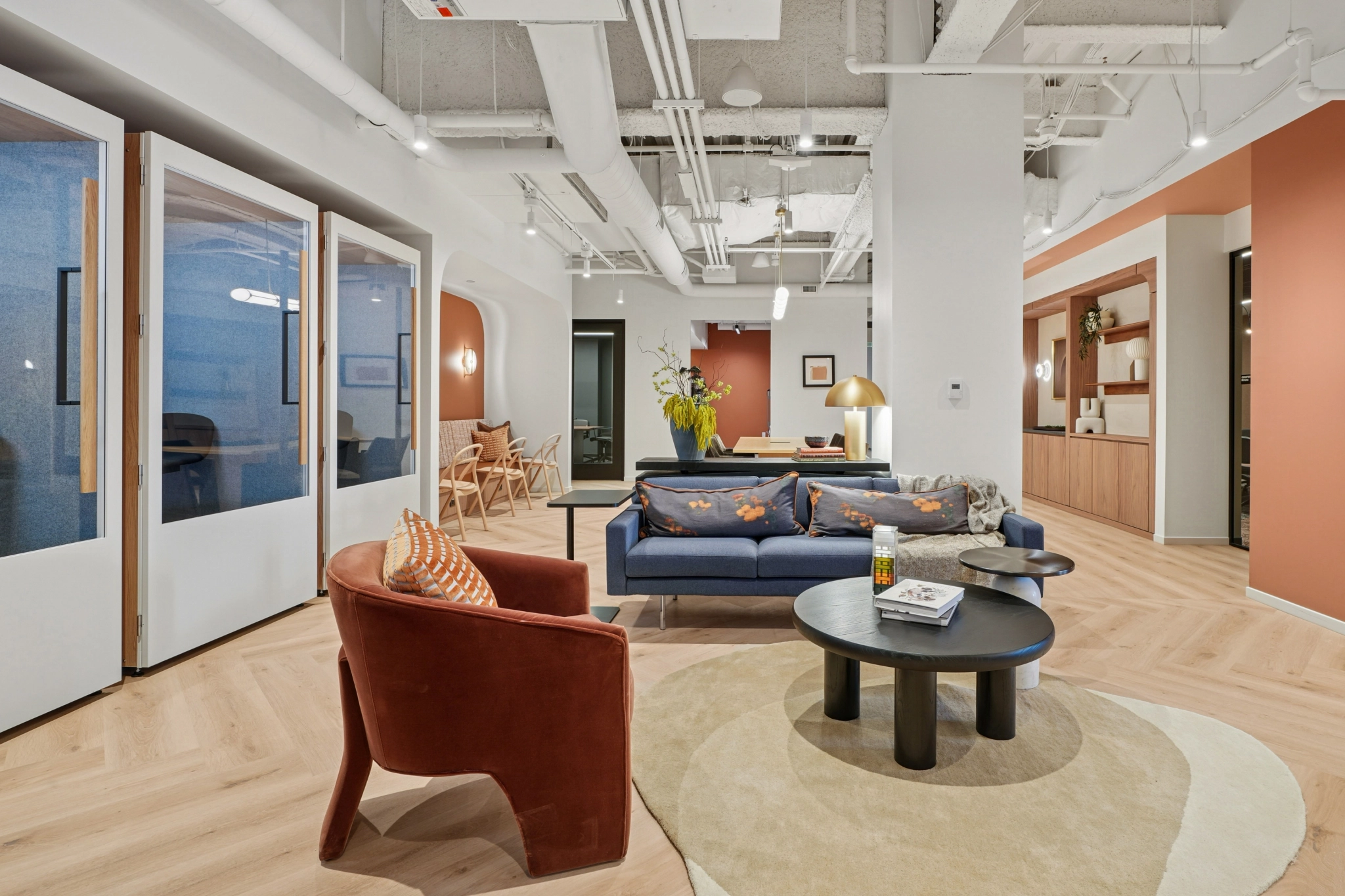 a large, bright meeting room with a large screen