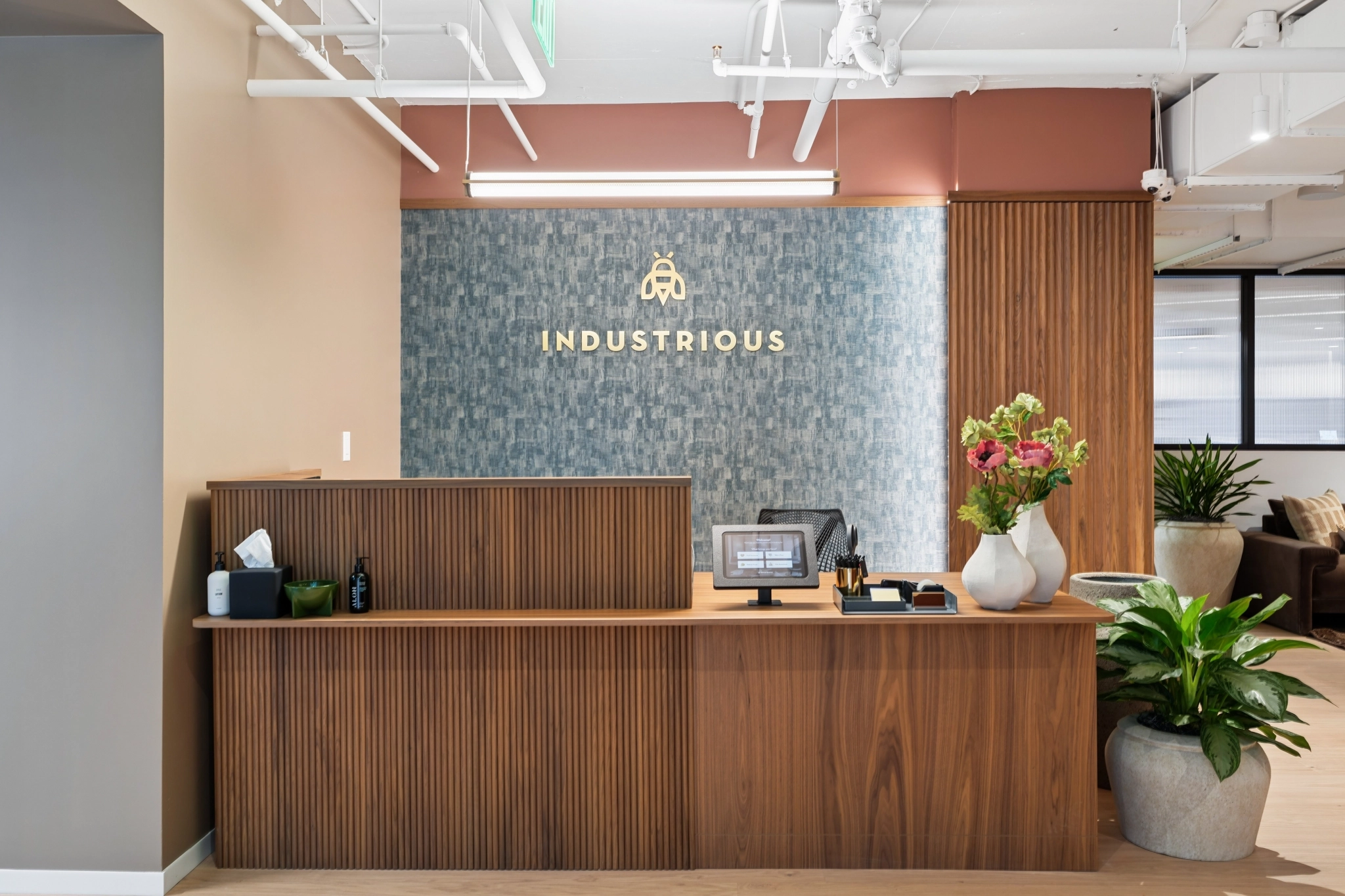 a large, bright meeting room with a large screen