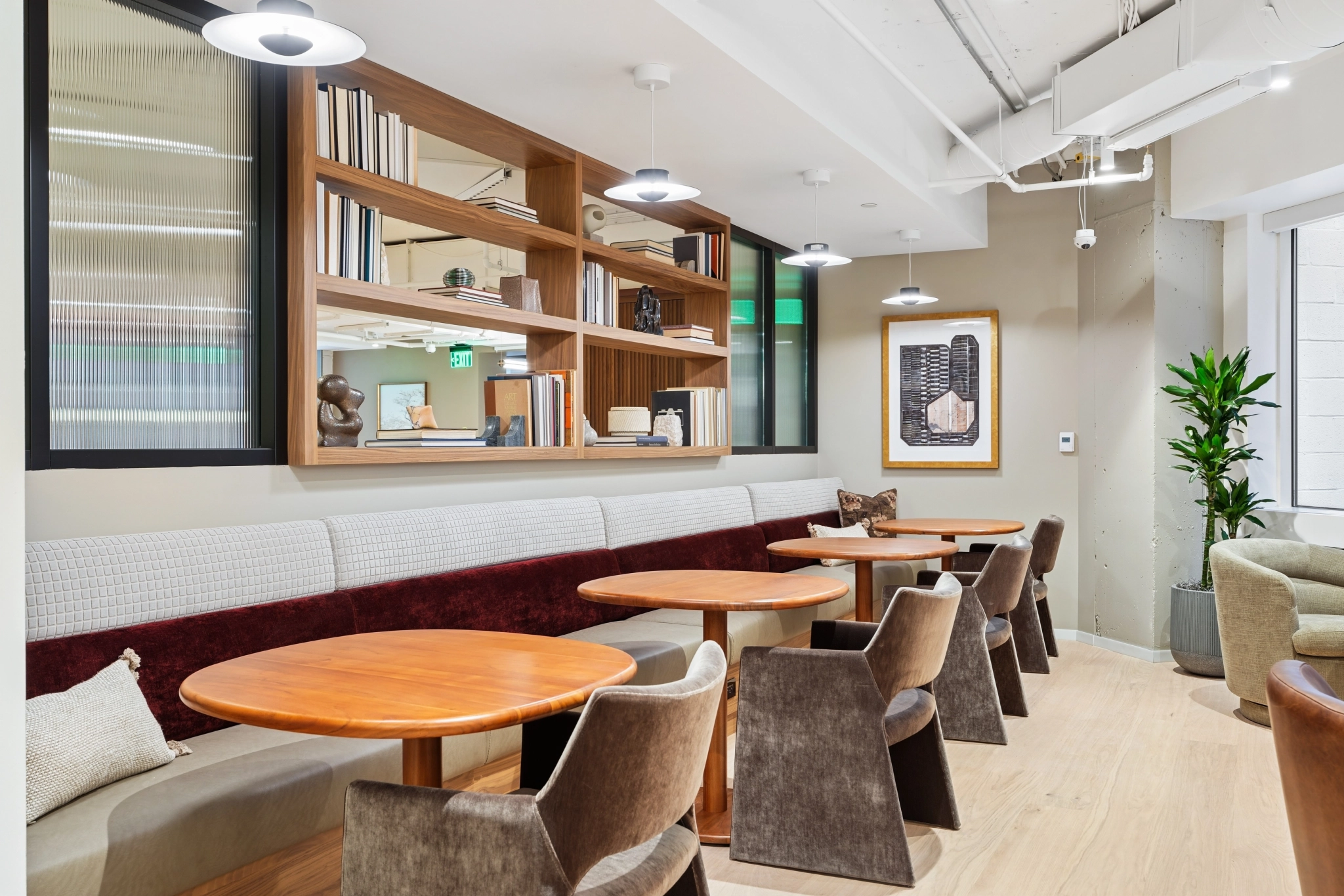 a large, bright meeting room with a large screen