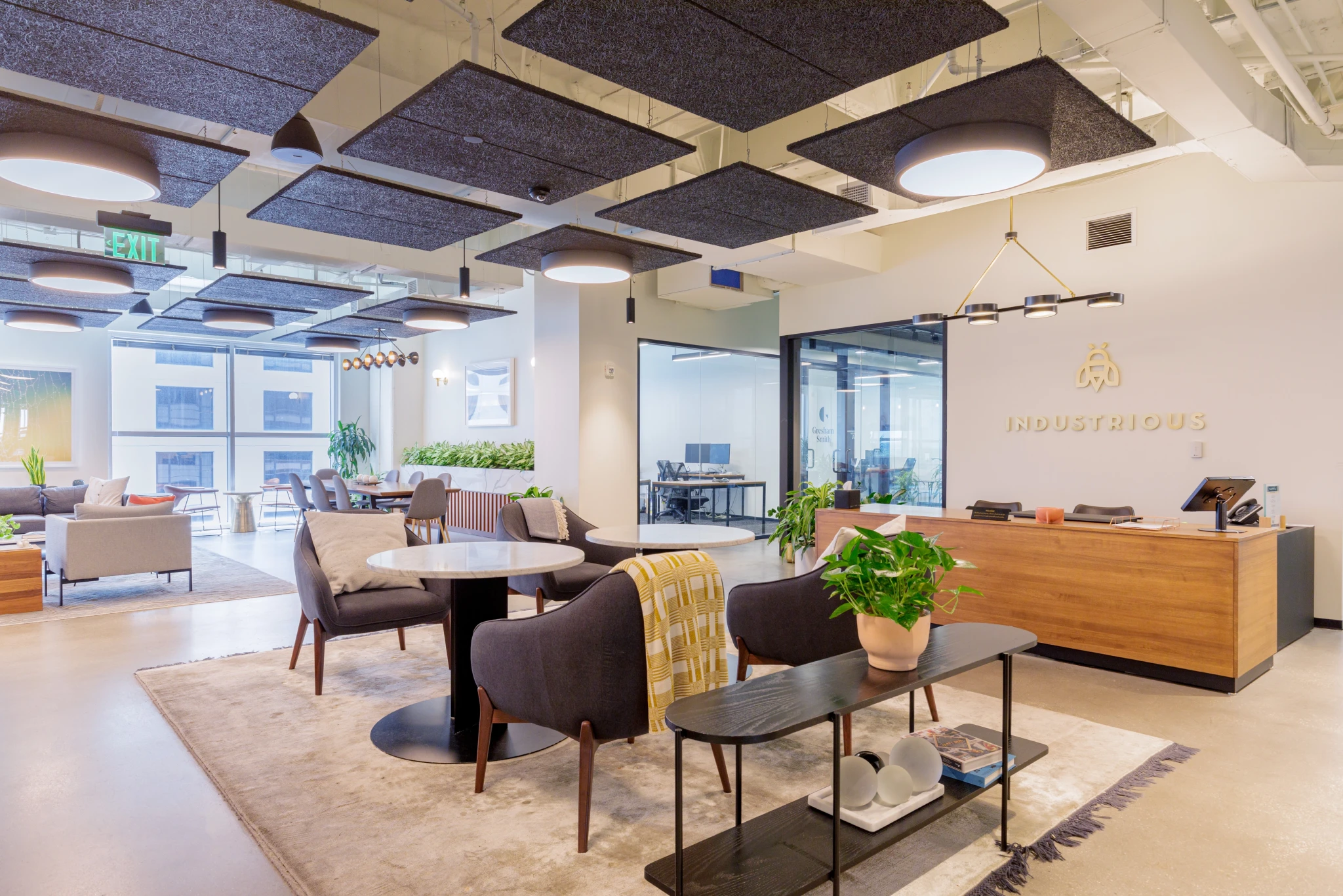 A modern Orlando workspace with a large table and chairs in a meeting room.