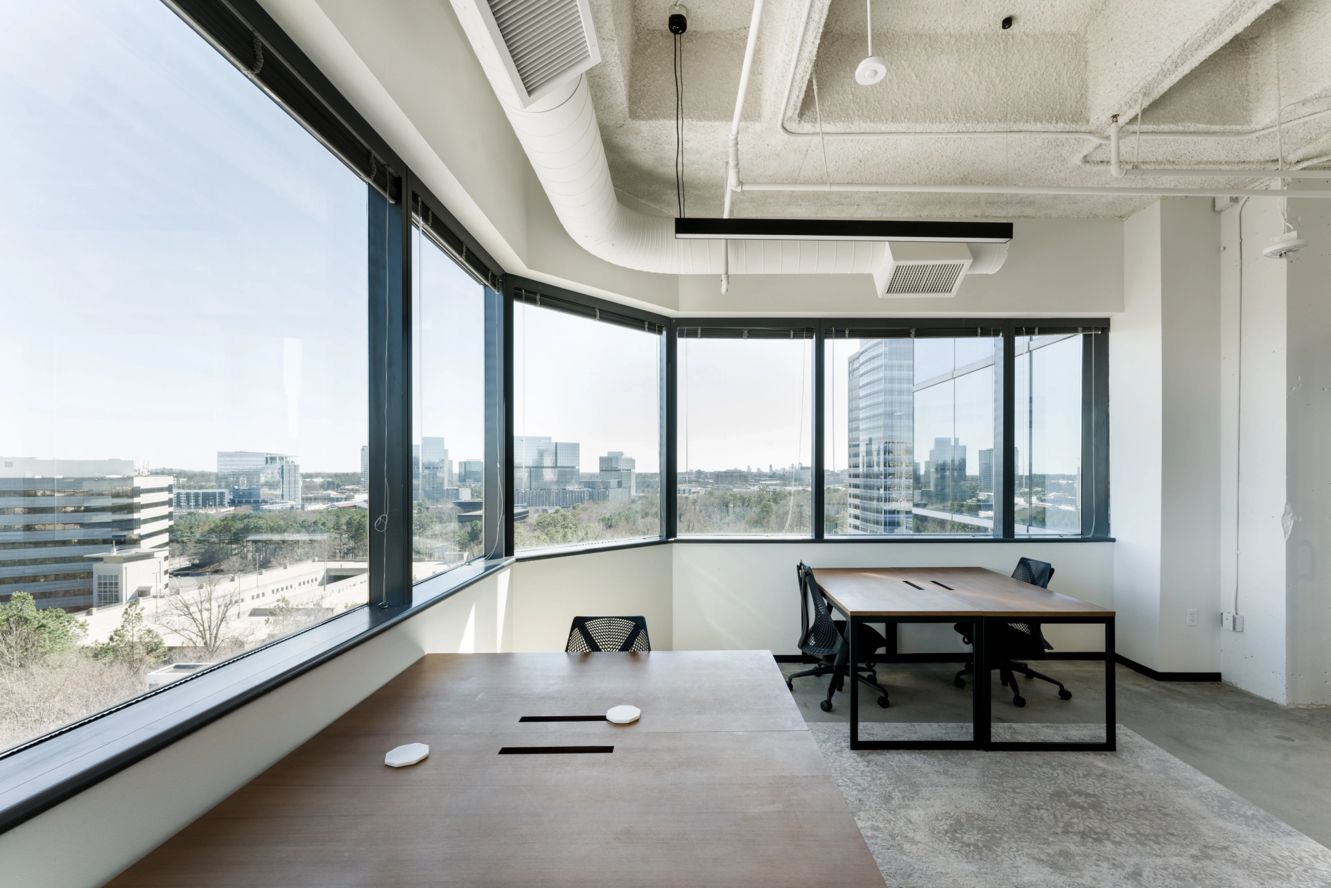 A coworking office in Atlanta with large windows overlooking the city.