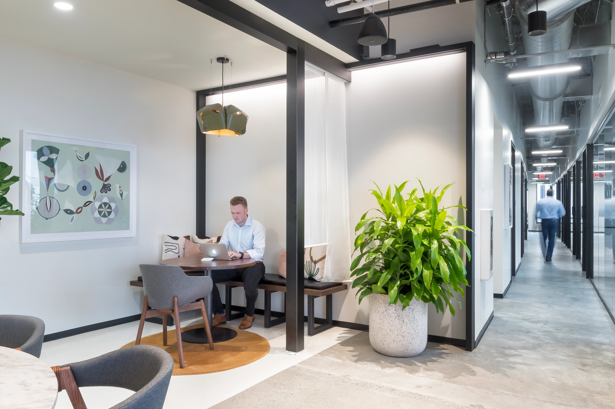 a man sits at a desk in an Atlanta office.