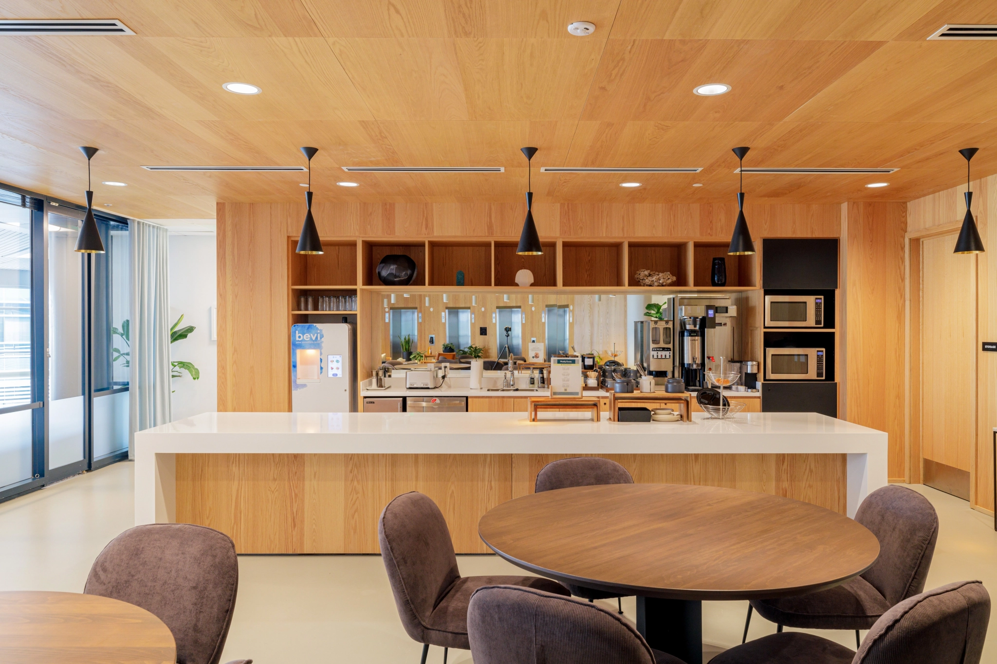 a wooden ceiling in an office meeting room.