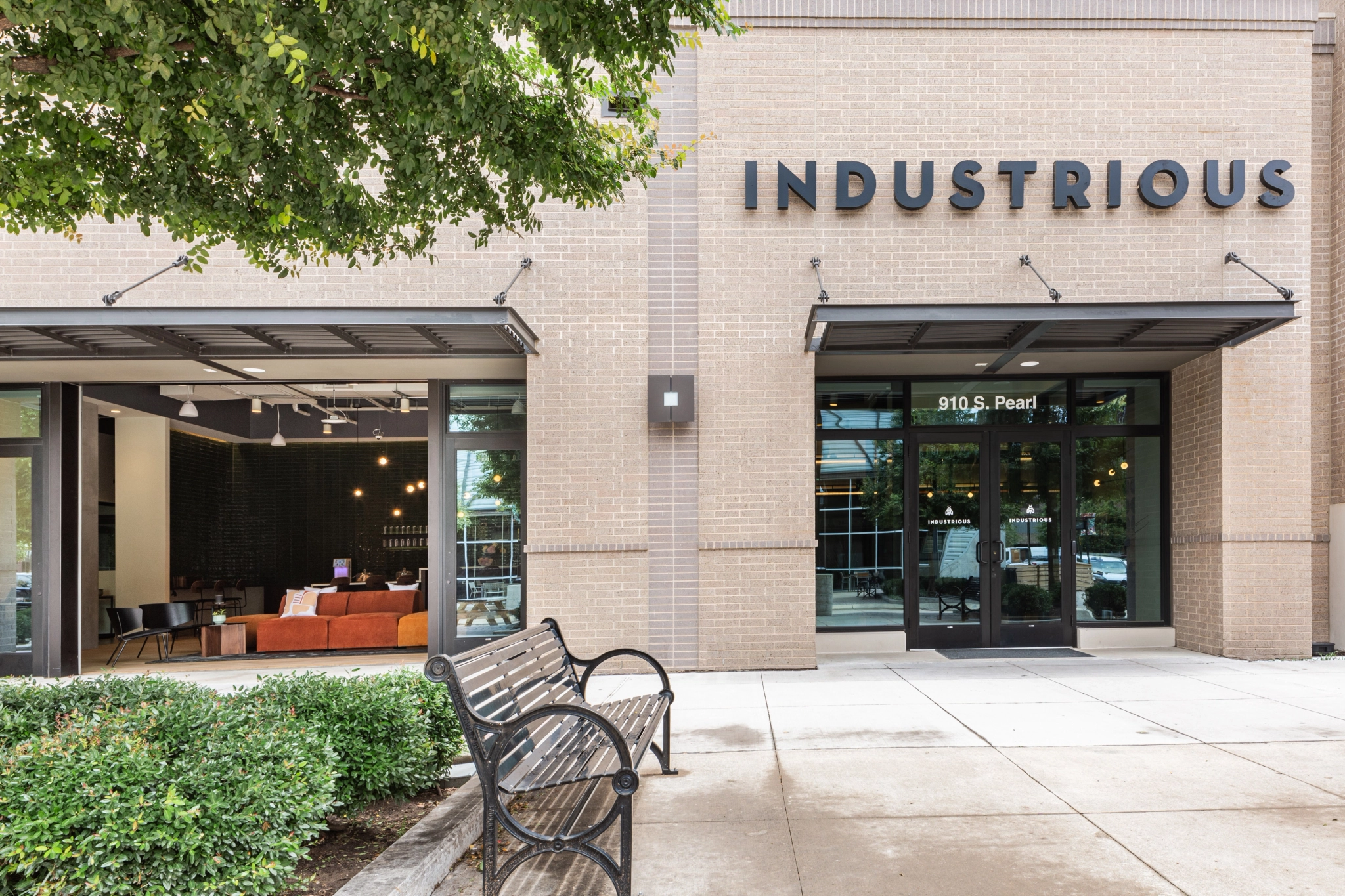 An industrial store in Dallas with a bench.