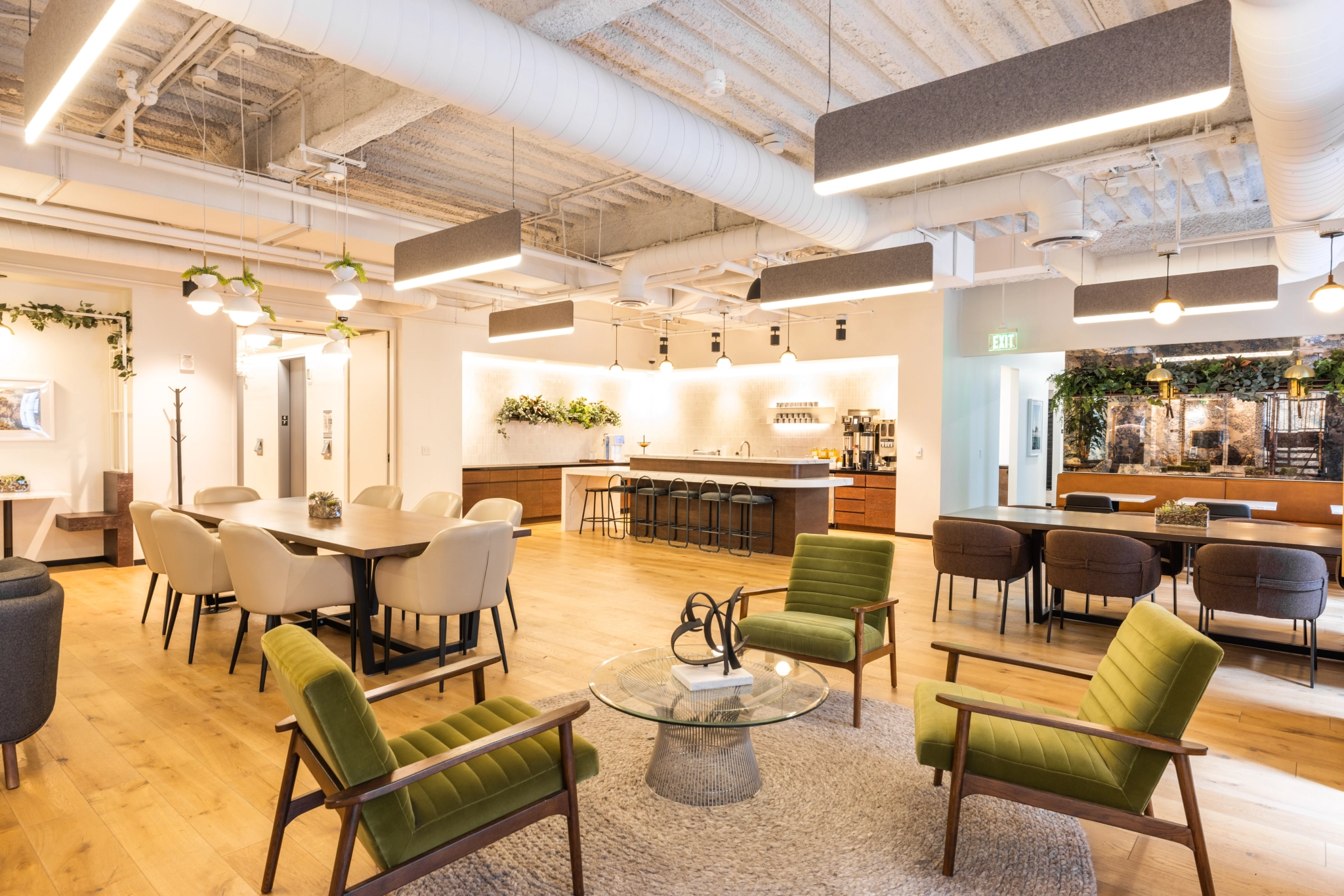 A modern San Francisco workspace with a dining table and chairs.