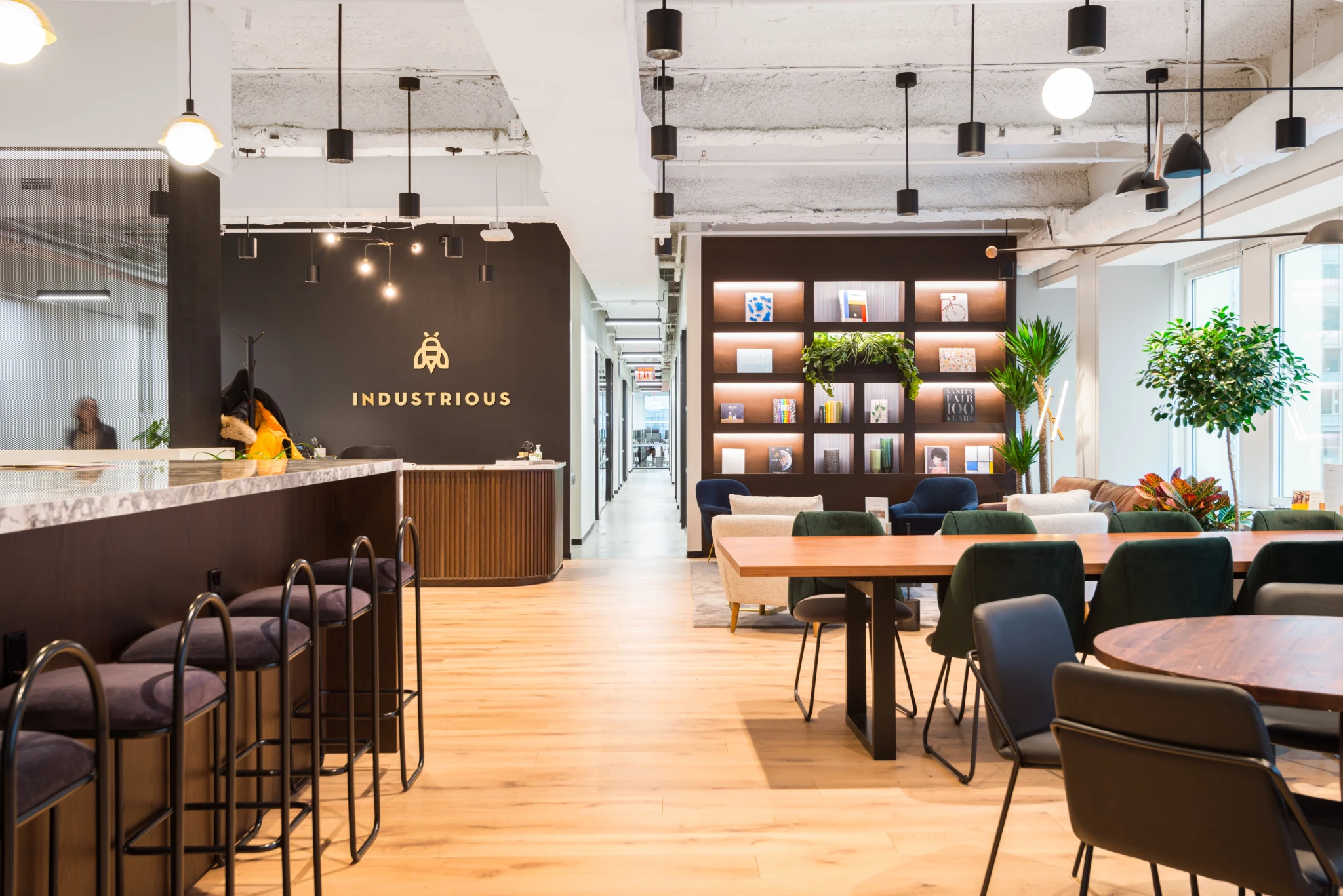 A coworking office with tables and chairs for a productive workspace.