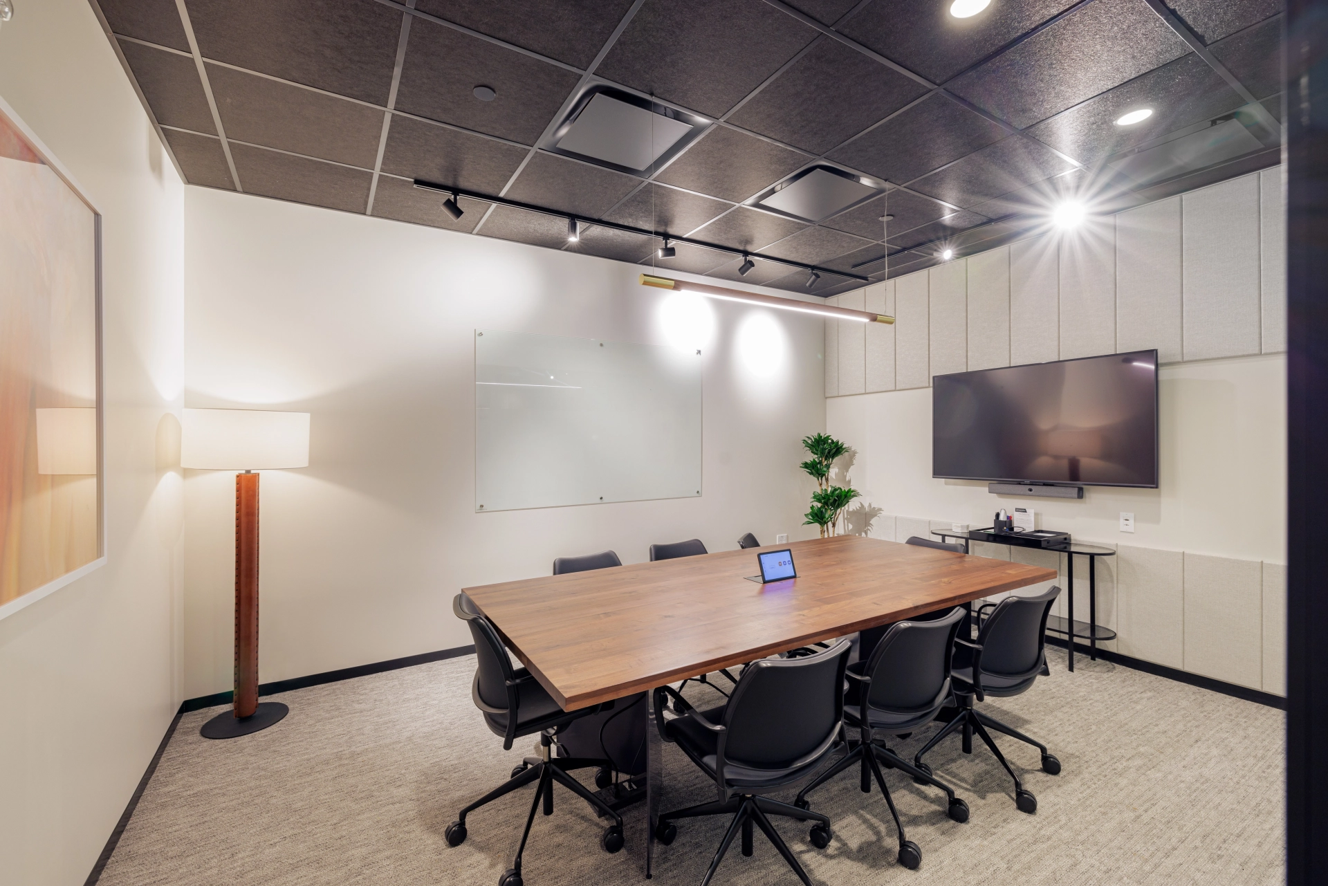 An office conference room in Palo Alto with a table and chairs, designed for productive workspace.