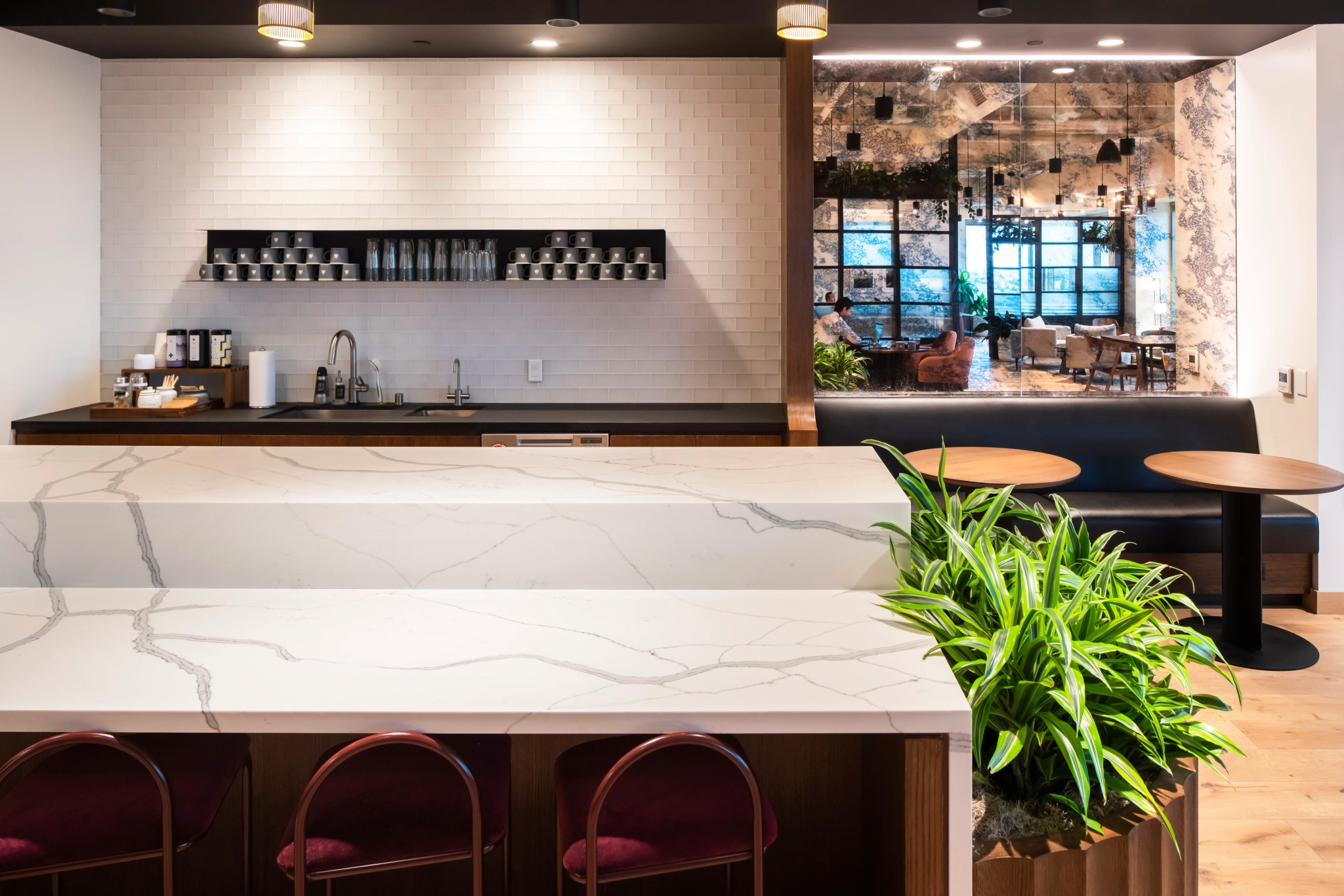 a Starbucks coffee shop with a marble counter top offering coworking and workspace options.