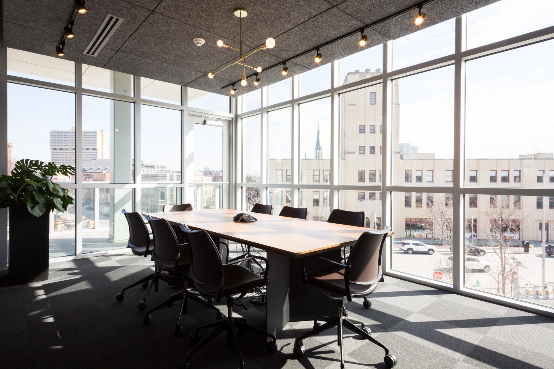 An Indianapolis office with a spacious meeting room featuring a large table and chairs.