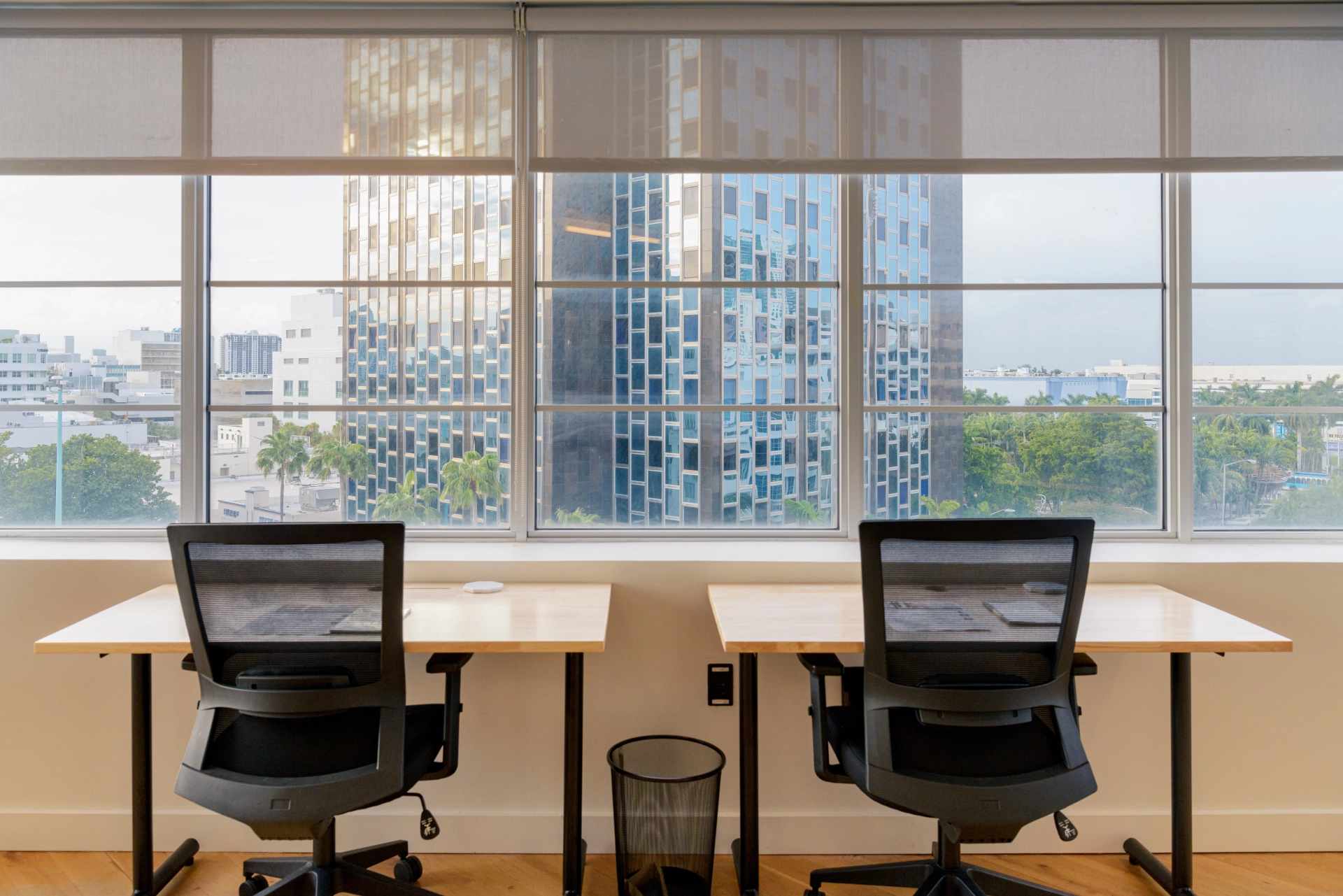 A city view window in an office or coworking meeting room.