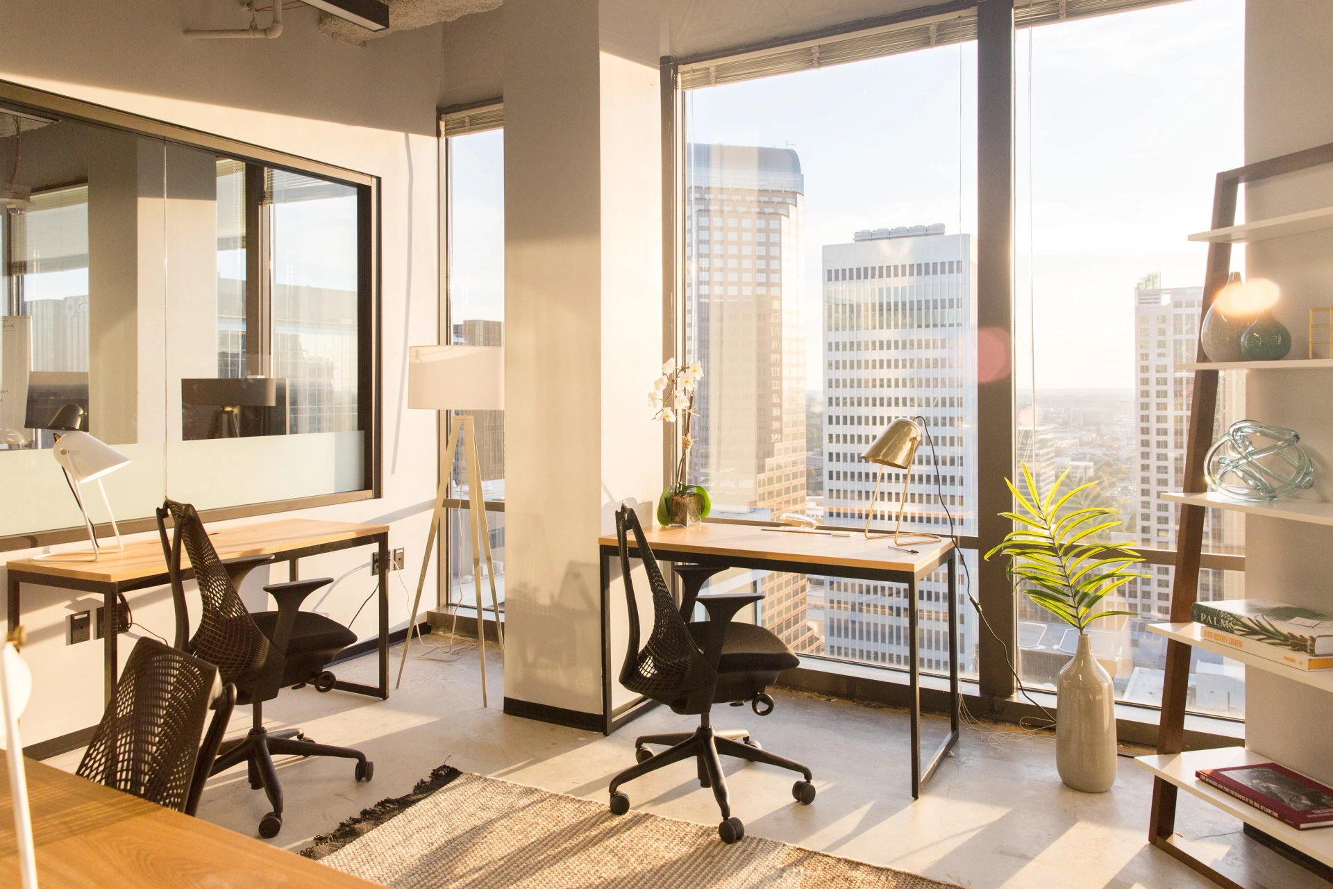 A coworking space with a desk offering a stunning city view.