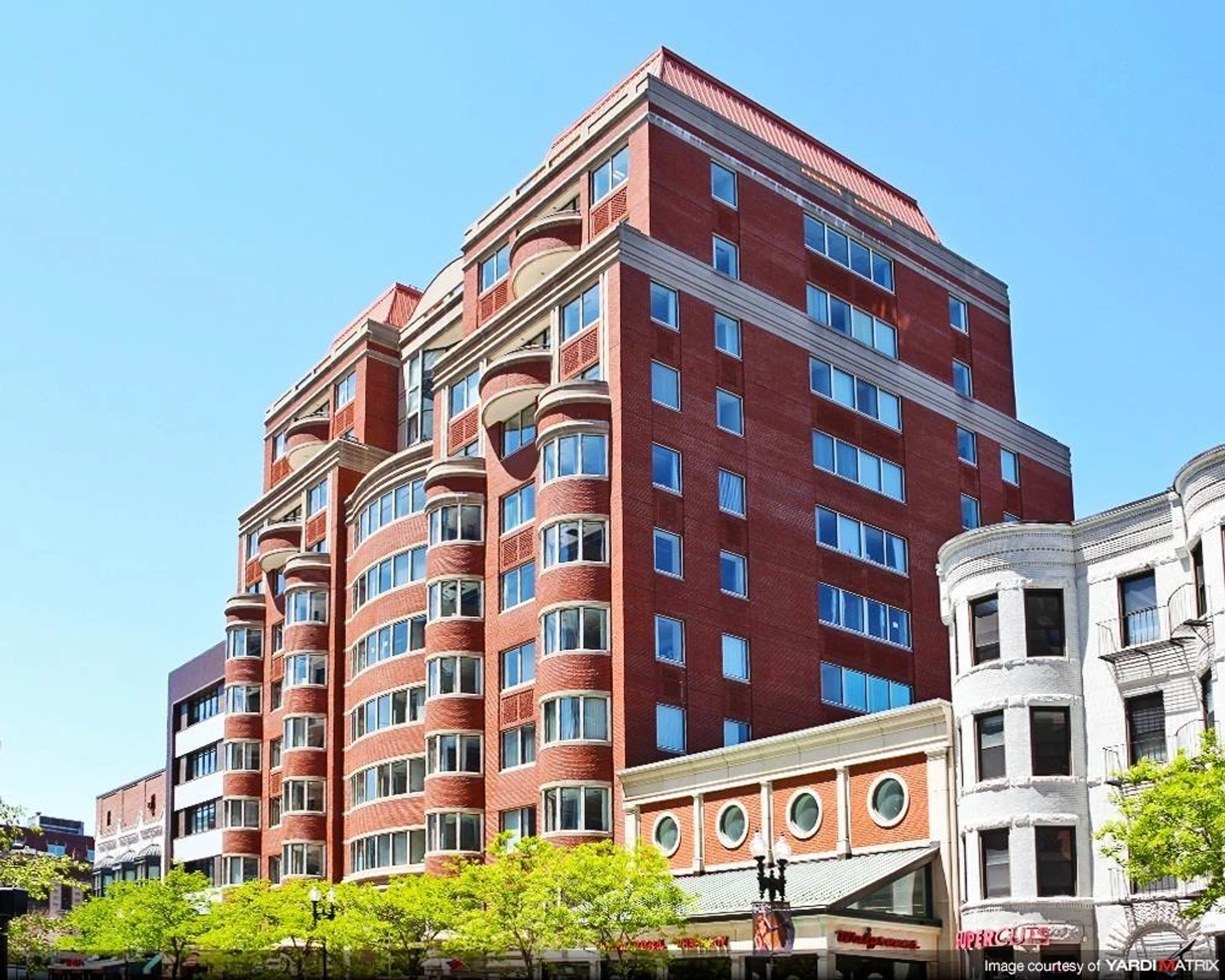 A large coworking office in the middle of urban Boston.