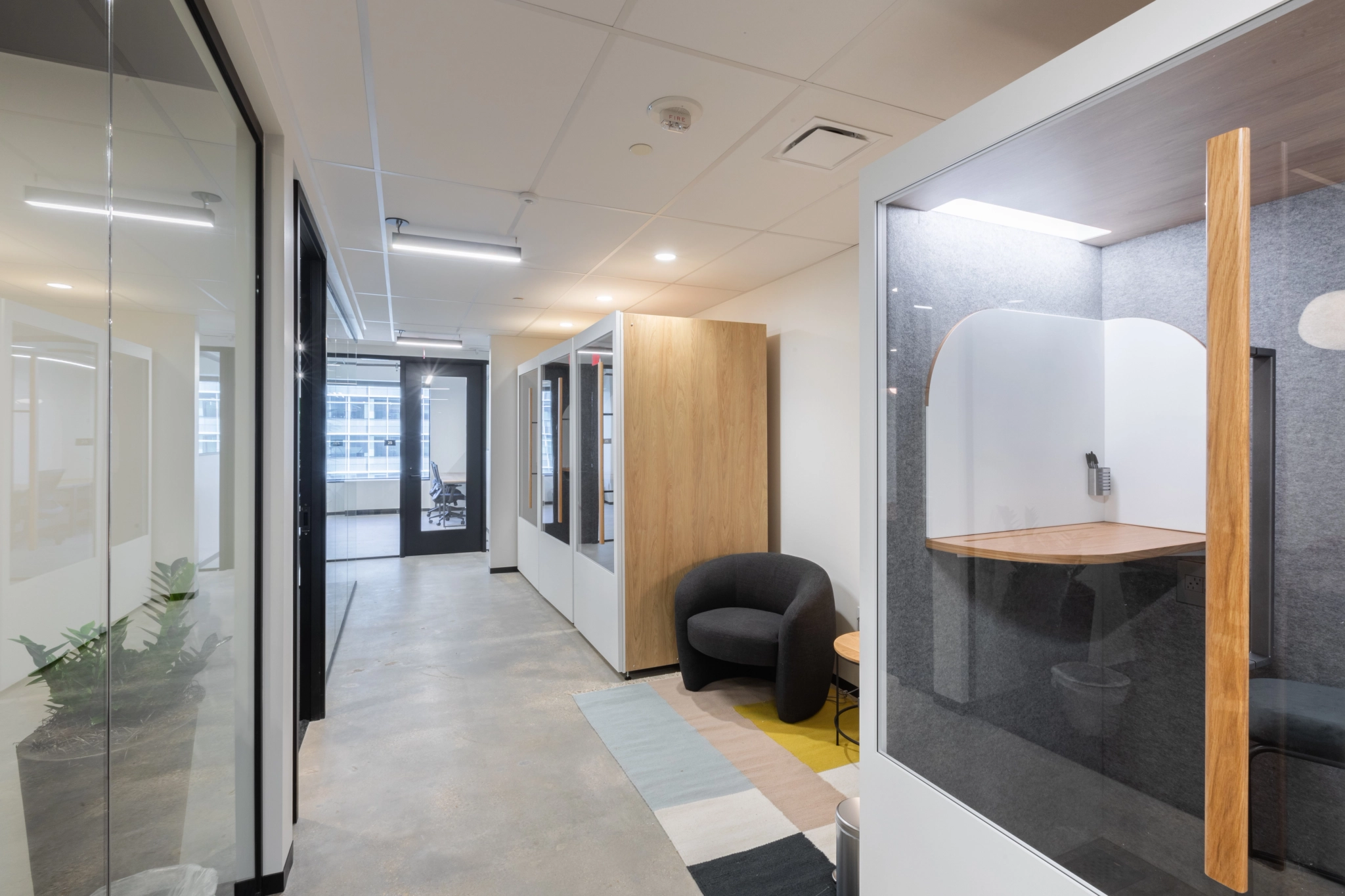 A Washington office with a glass door and a desk.