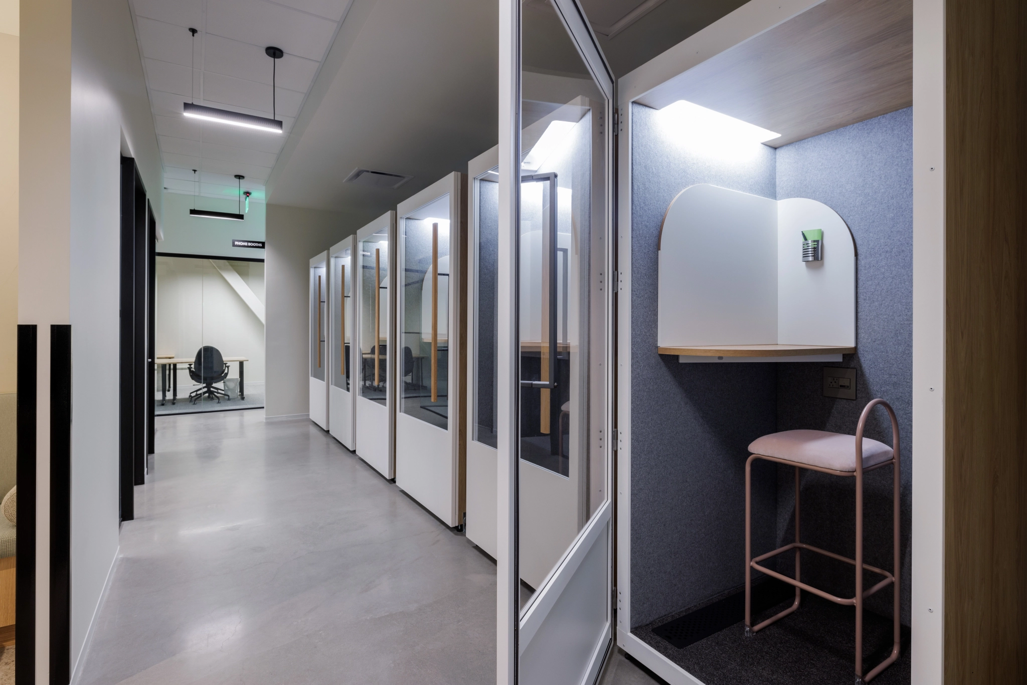 A San Francisco hallway with a row of office cubicles.