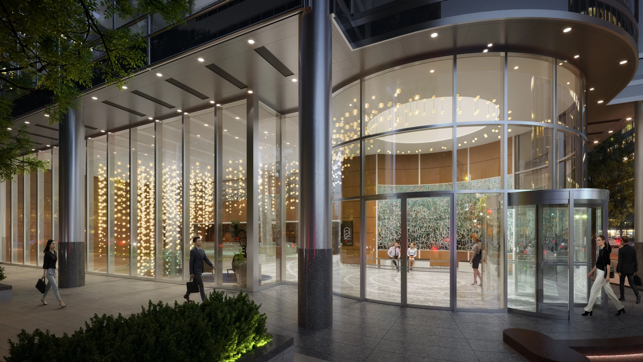 A modern glass building entrance at dusk with illuminated interiors and an elegant chandelier. Several people are walking in and out of the revolving door, likely heading to the stylish meeting room or bustling workspace within. WASHINGTON exudes a sense of sophistication and purpose.