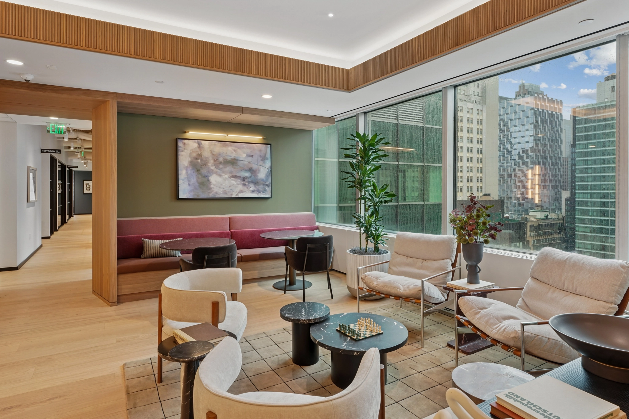 a large, bright meeting room with a large screen