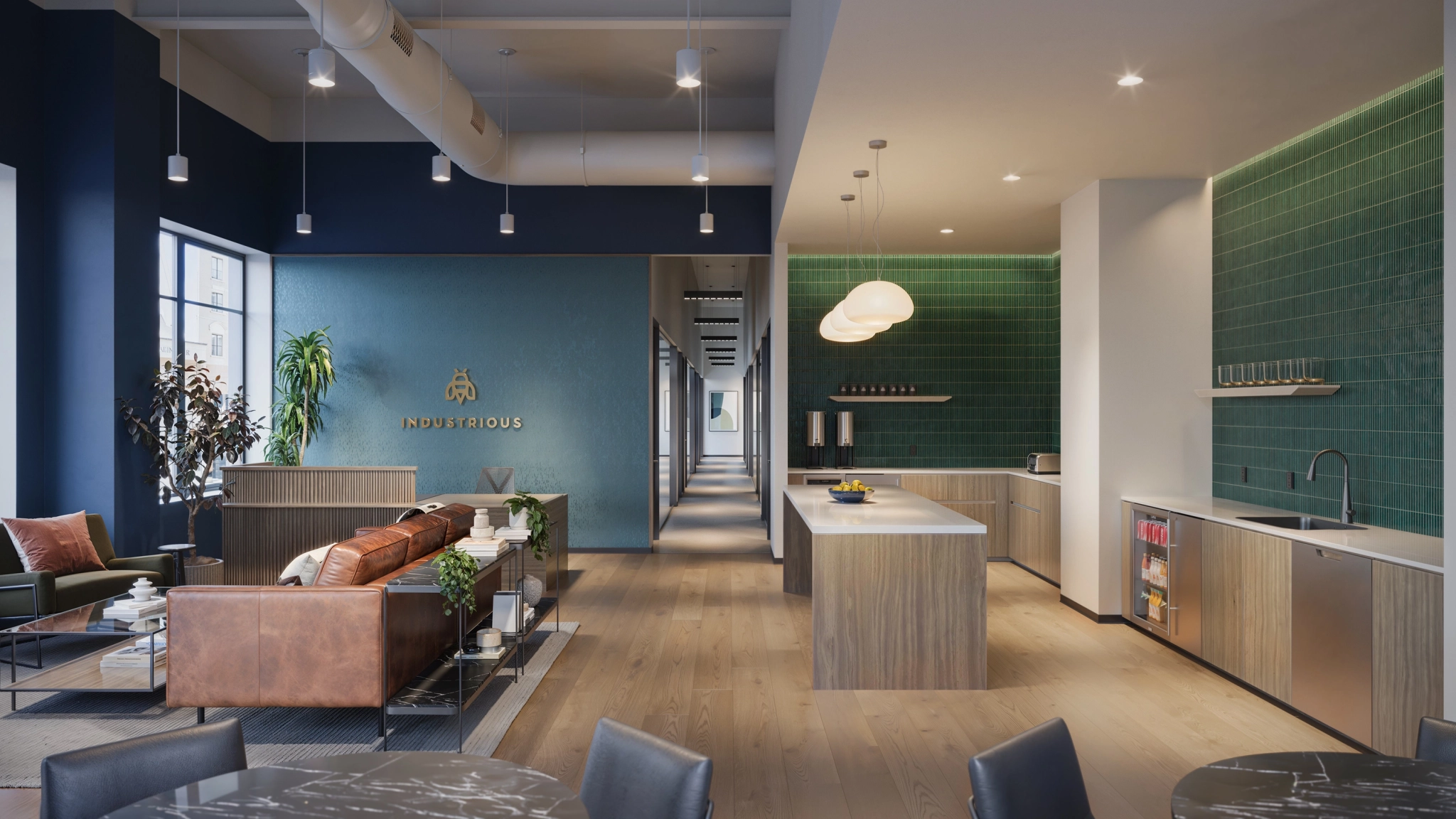 Coworking Space und moderne Küche von Carmel mit grün gefliestem Backsplash, Holzböden, Ledersofas, Arbeitsinsel und großen Fenstern, die das Büro mit Tageslicht durchfluten.