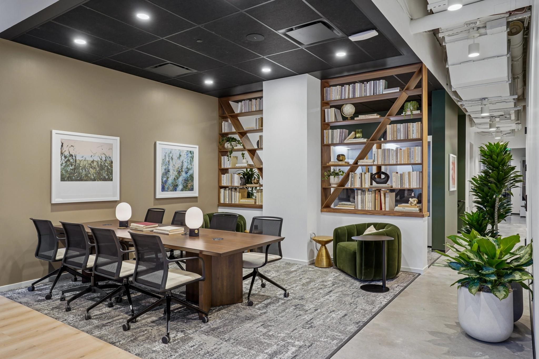 a large, bright meeting room with a large screen