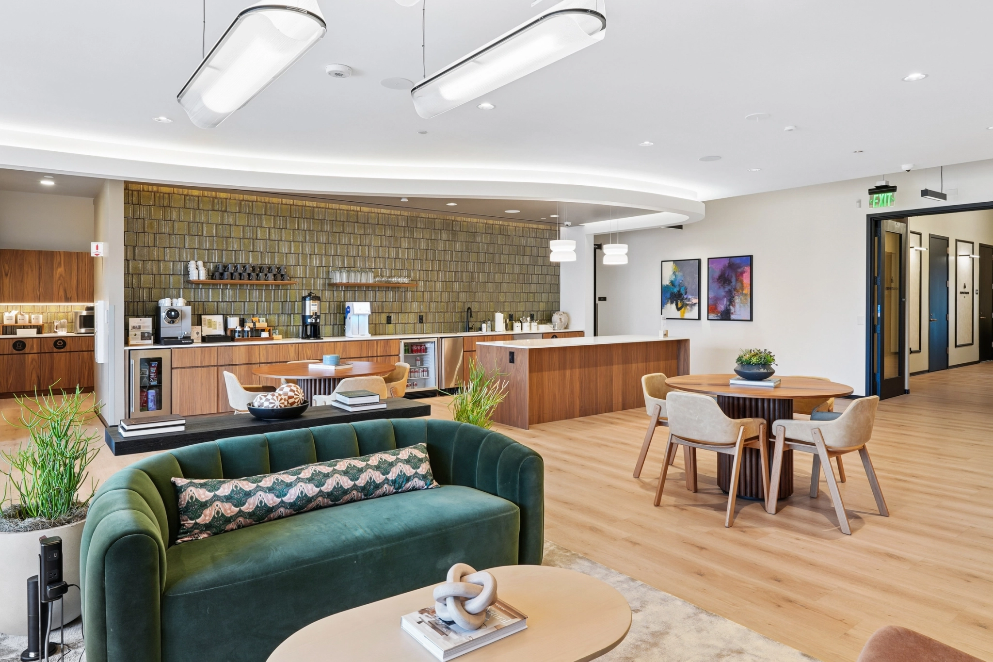 a large, bright meeting room with a large screen