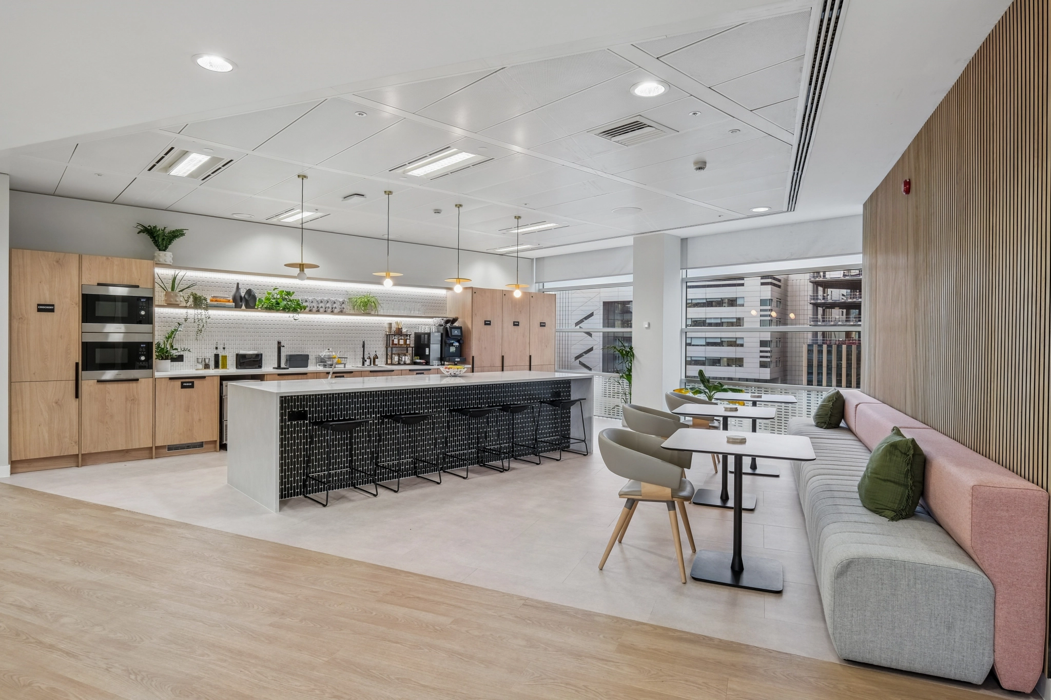 a large, bright meeting room with a large screen