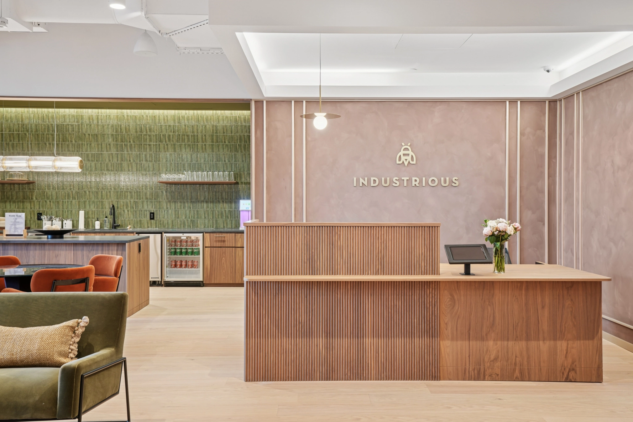 a large, bright meeting room with a large screen