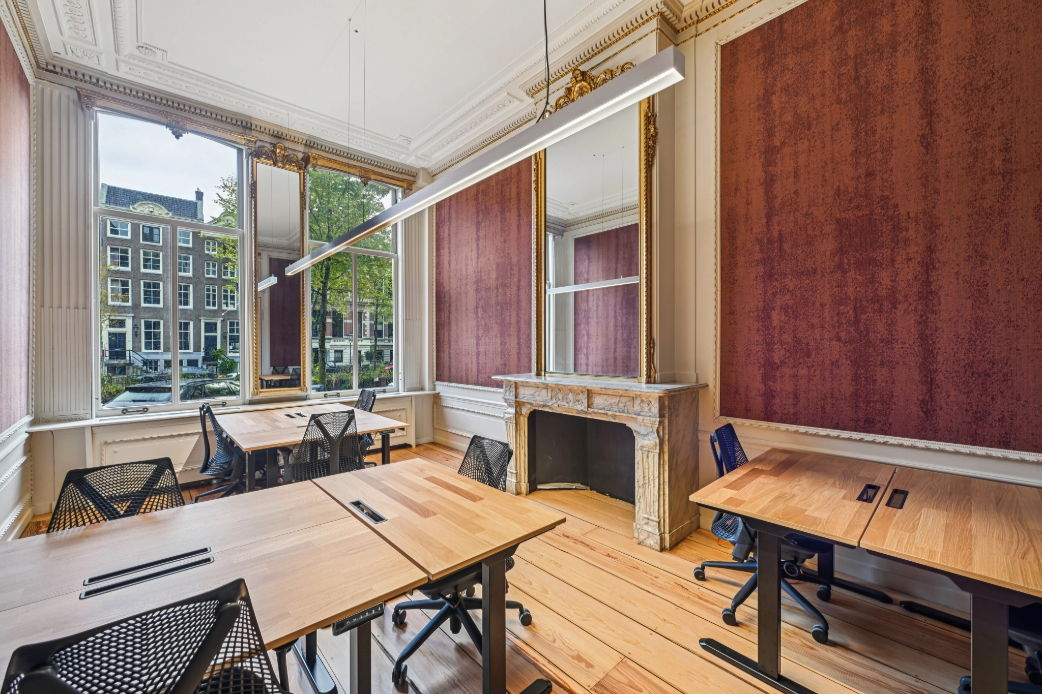 a large, bright meeting room with a large screen