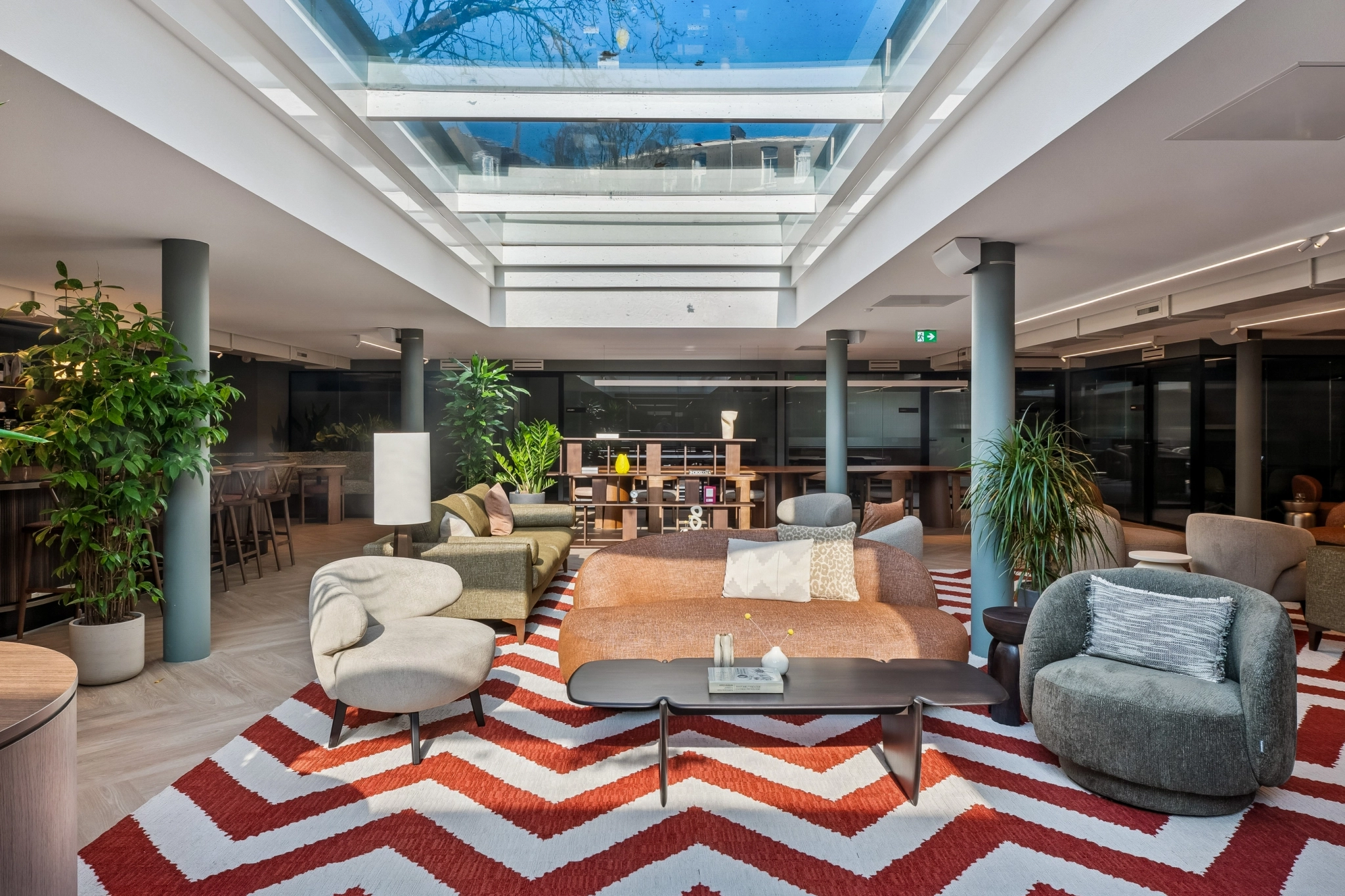 a large, bright meeting room with a large screen