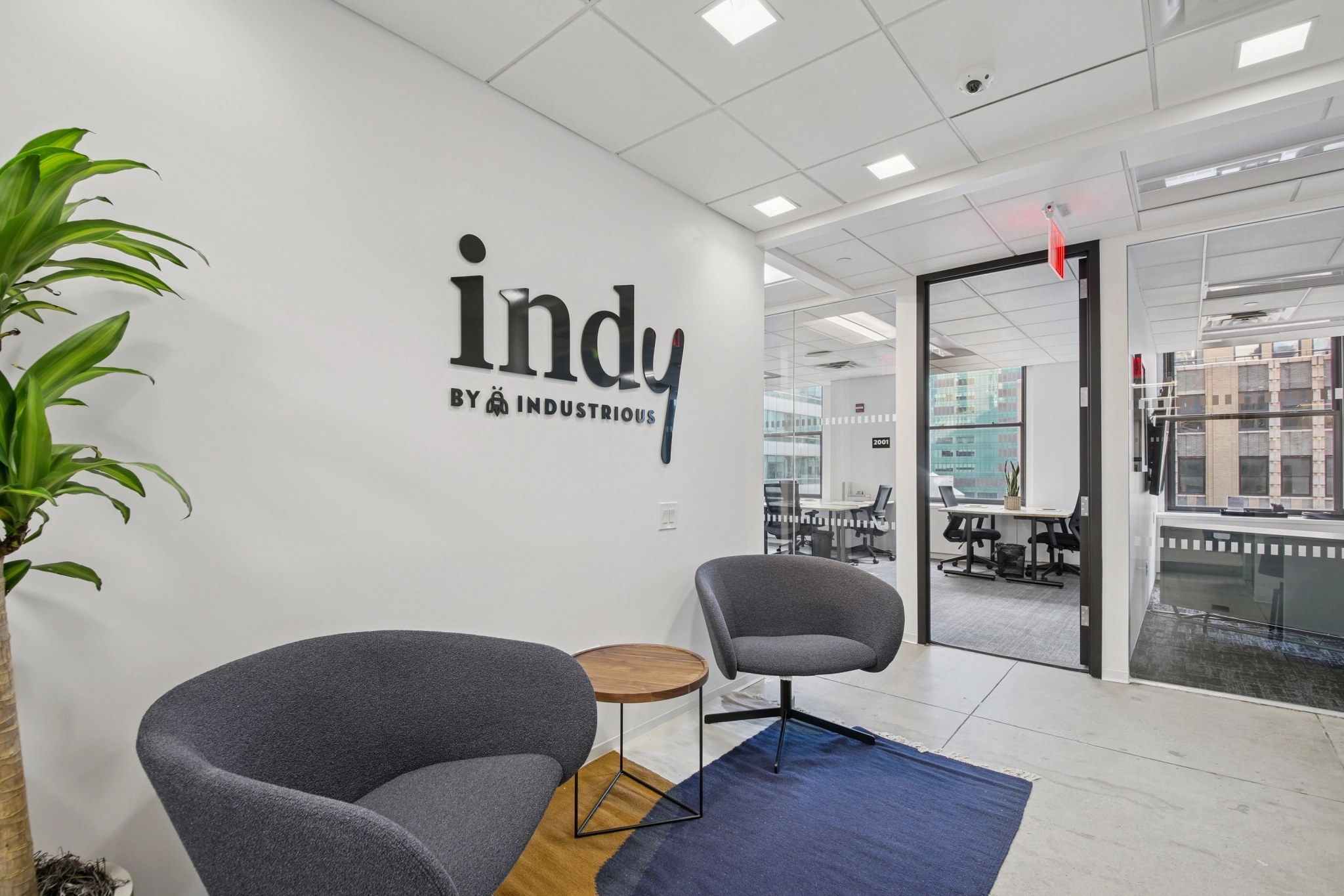 a large, bright meeting room with a large screen