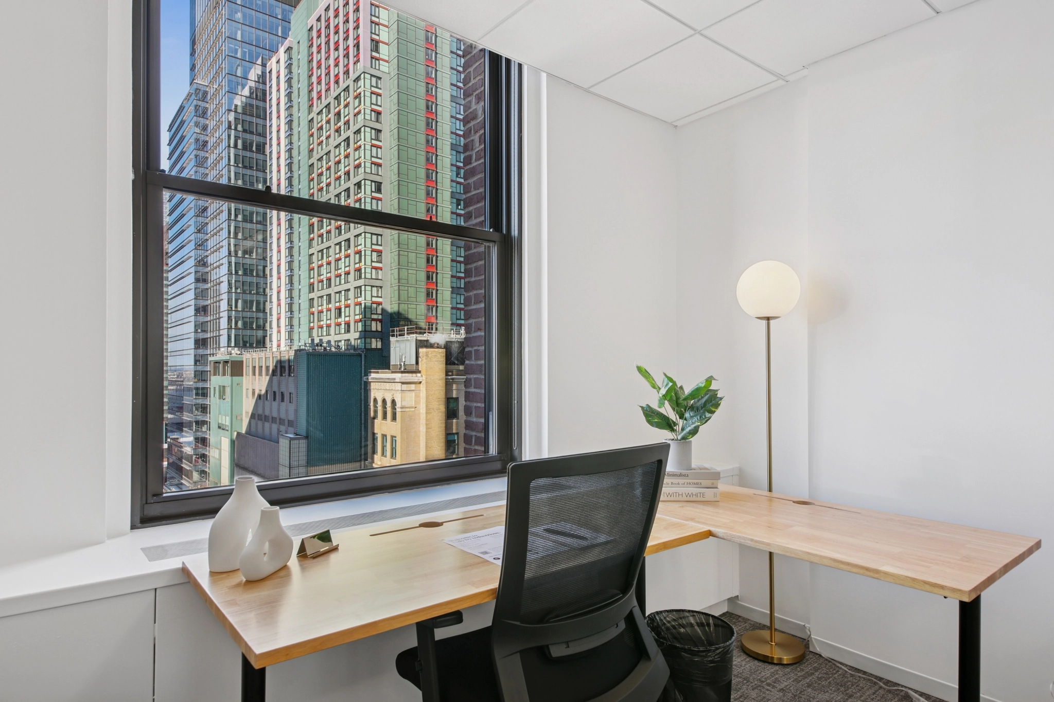 a large, bright meeting room with a large screen