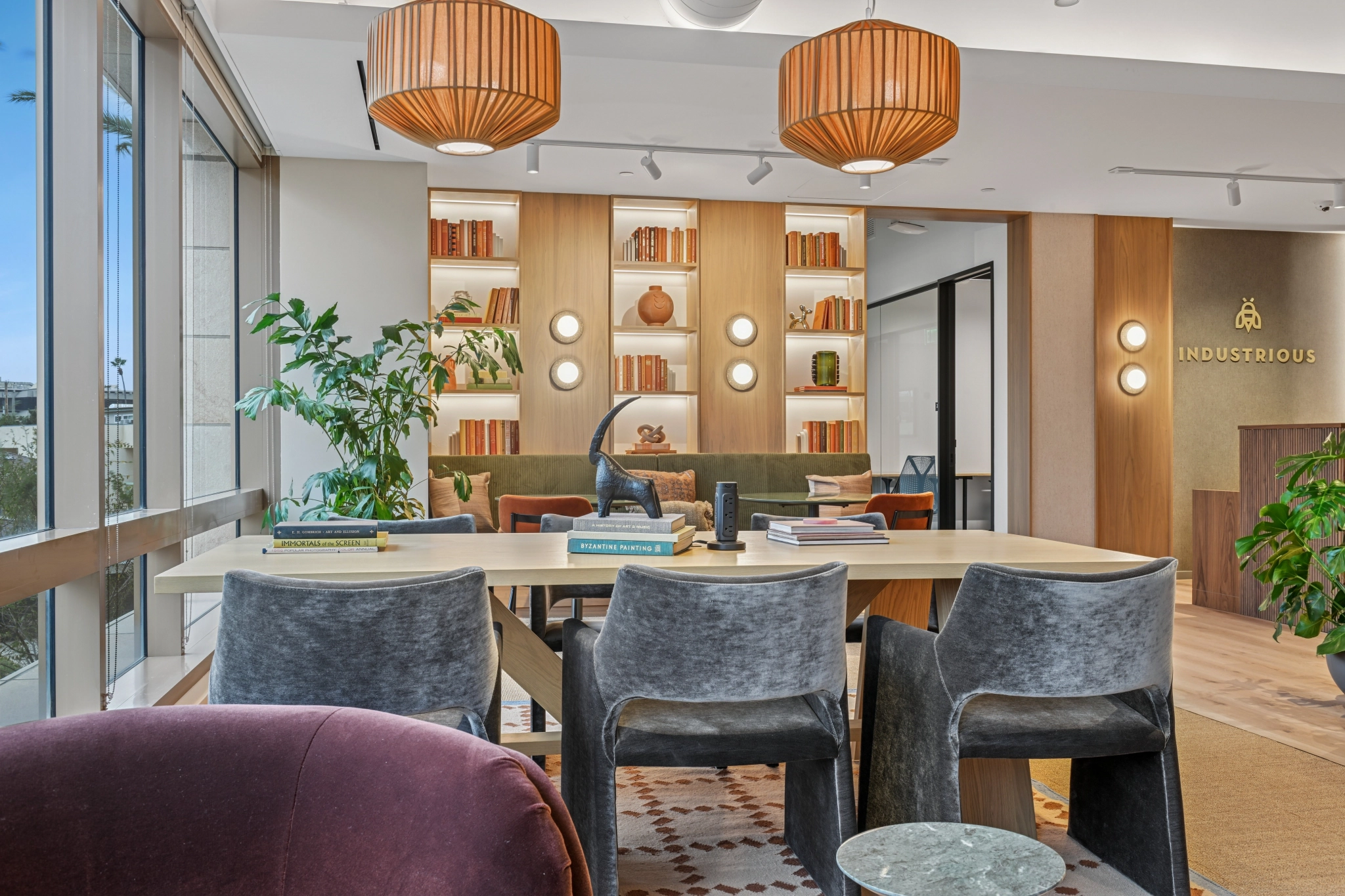 a large, bright meeting room with a large screen