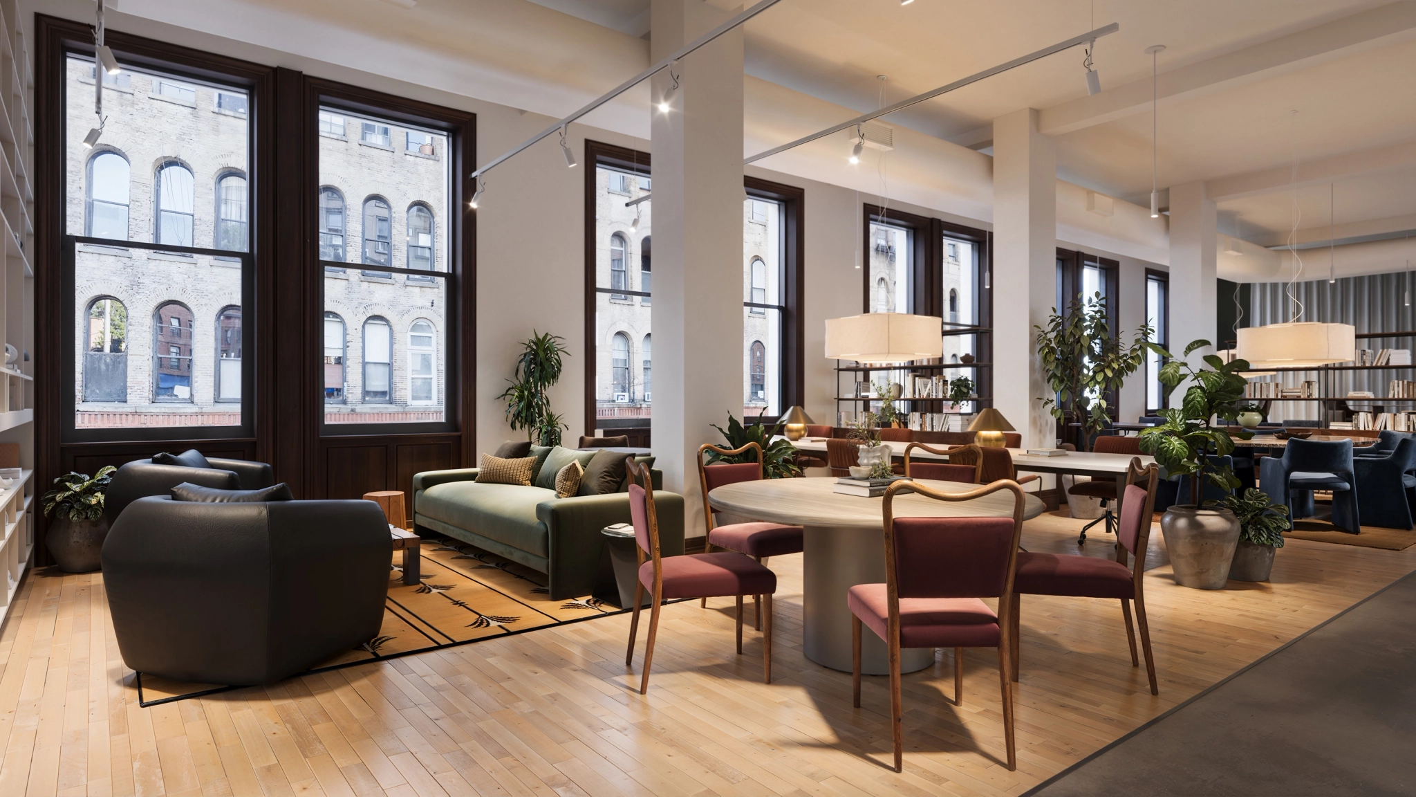 a large, bright meeting room with a large screen