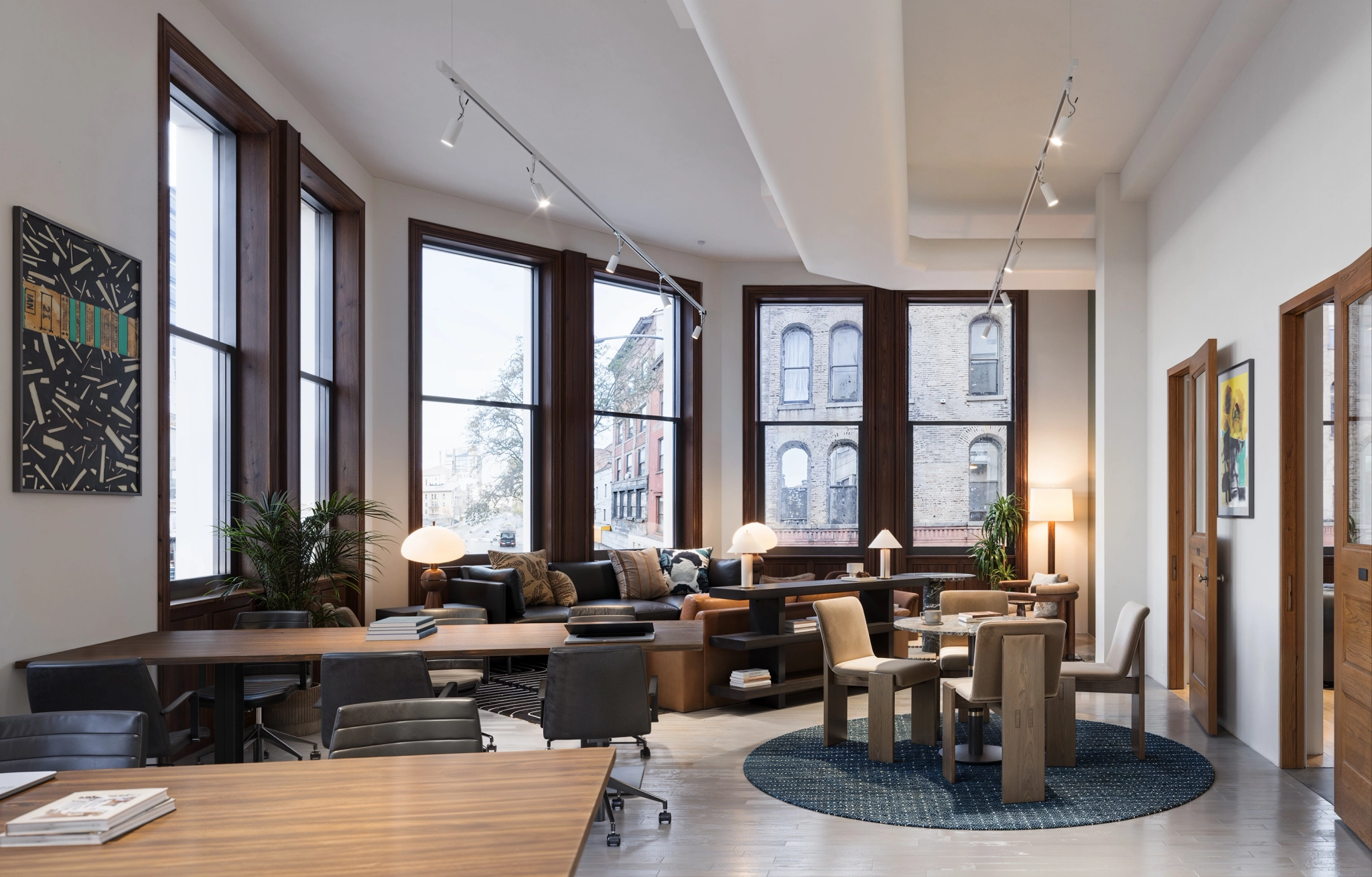 a large, bright meeting room with a large screen