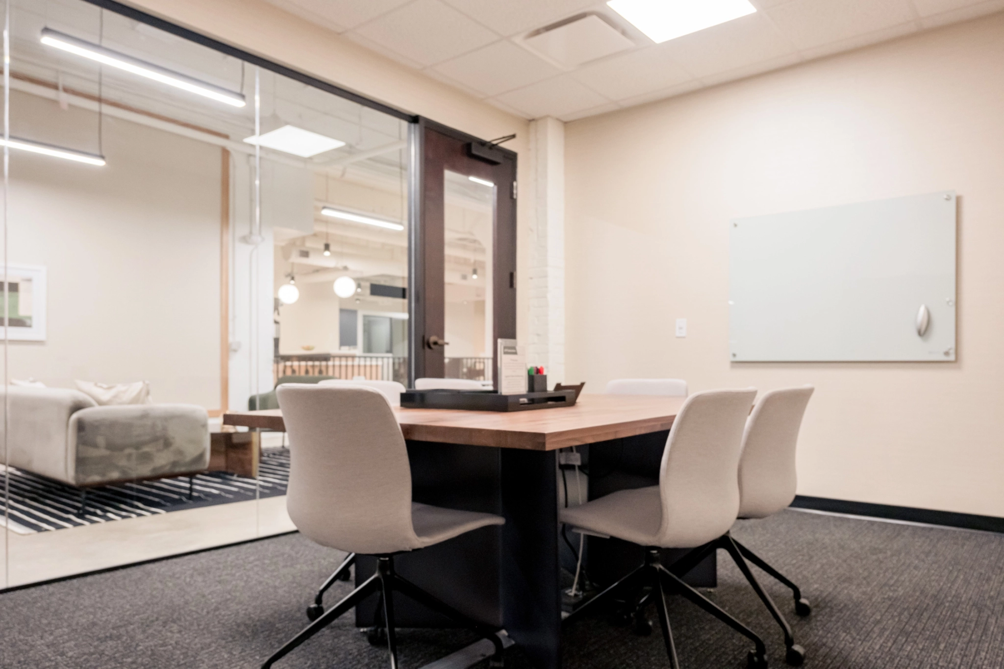 A meeting room in Indianapolis with a table and chairs.