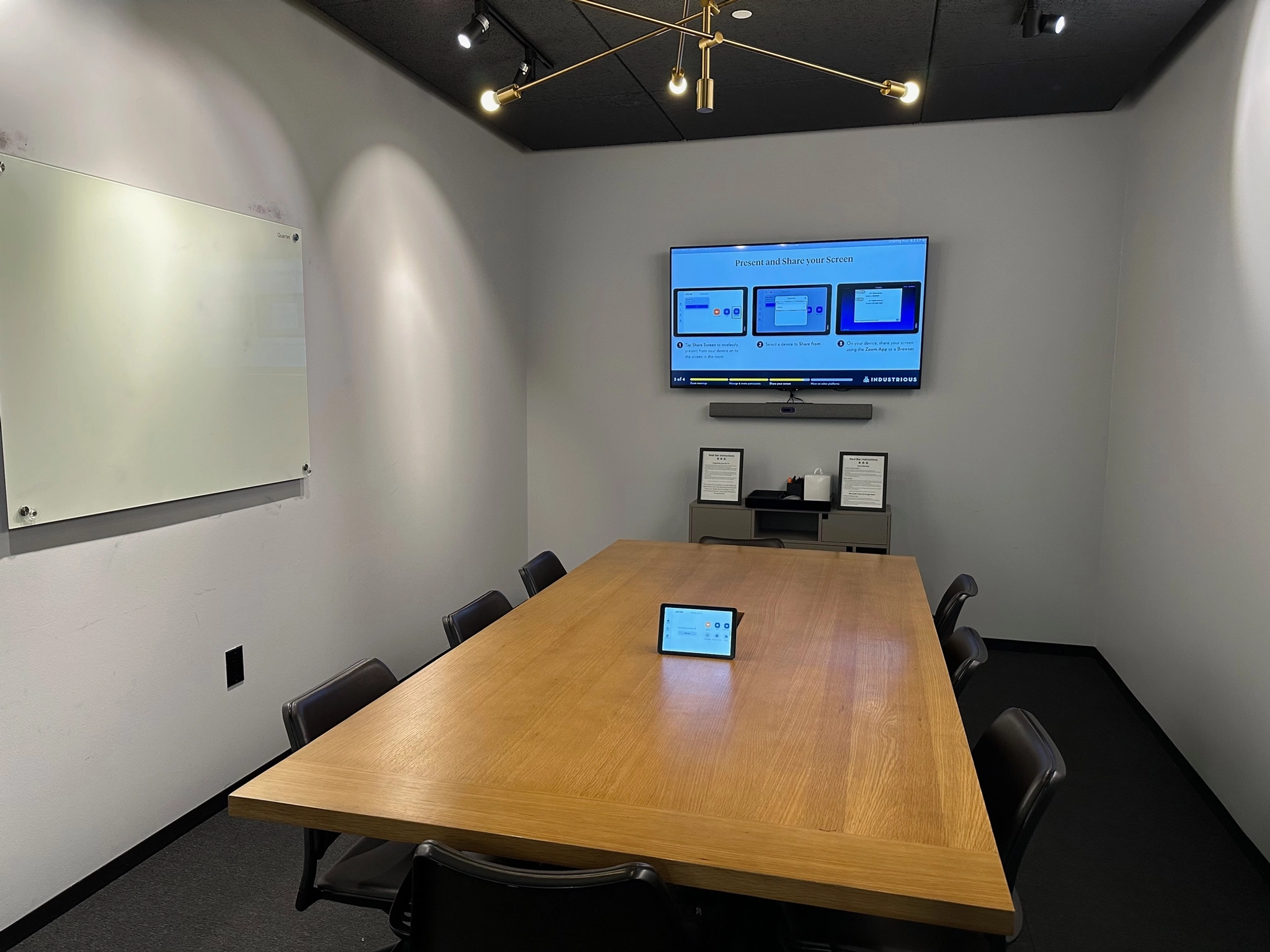 A Dallas meeting room with a tv on the wall.