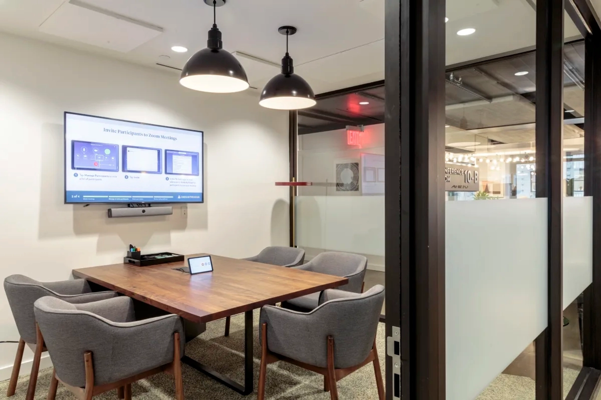 A New York conference room with a TV on the wall.