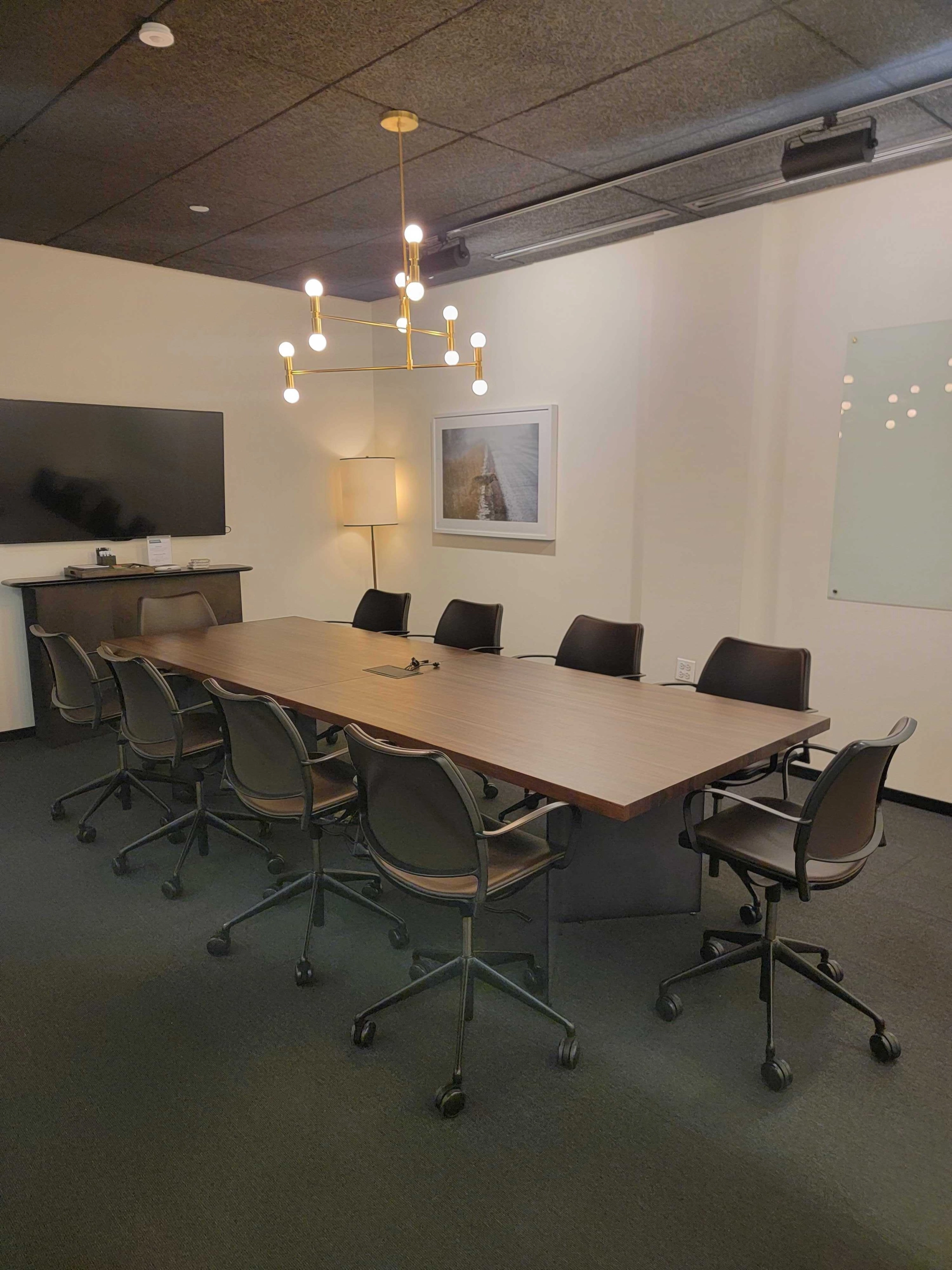 A Chicago conference room with a large table and chairs for office meetings.