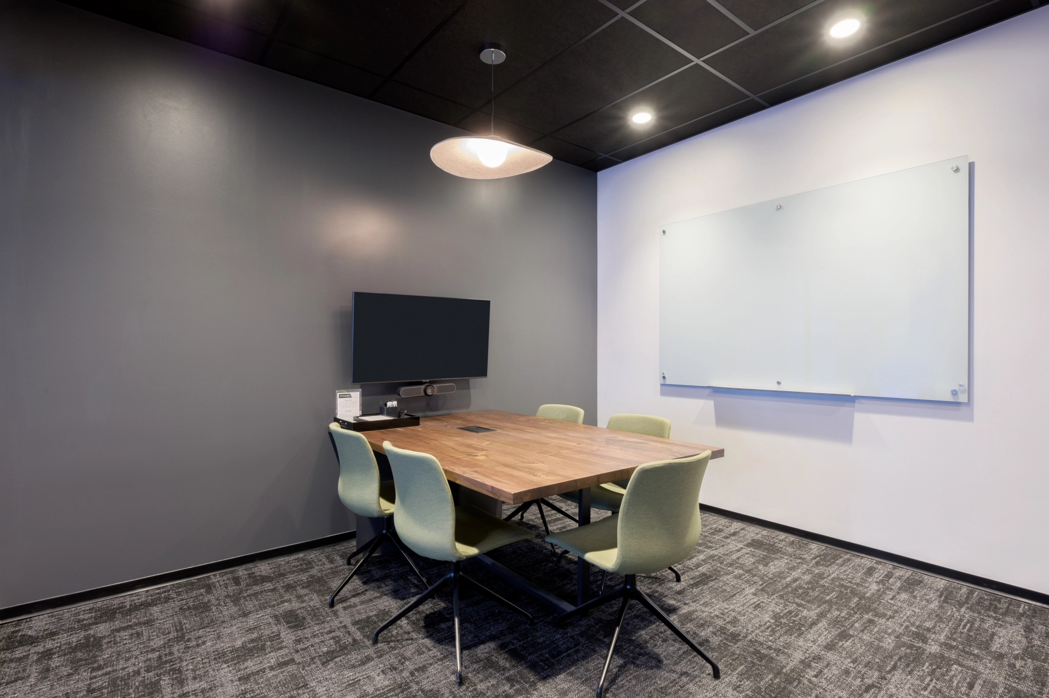 A coworking space with a table and chairs.