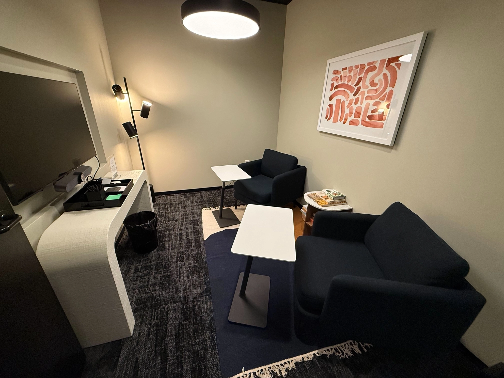 Cozy seating conference room that's great for 1:1's!